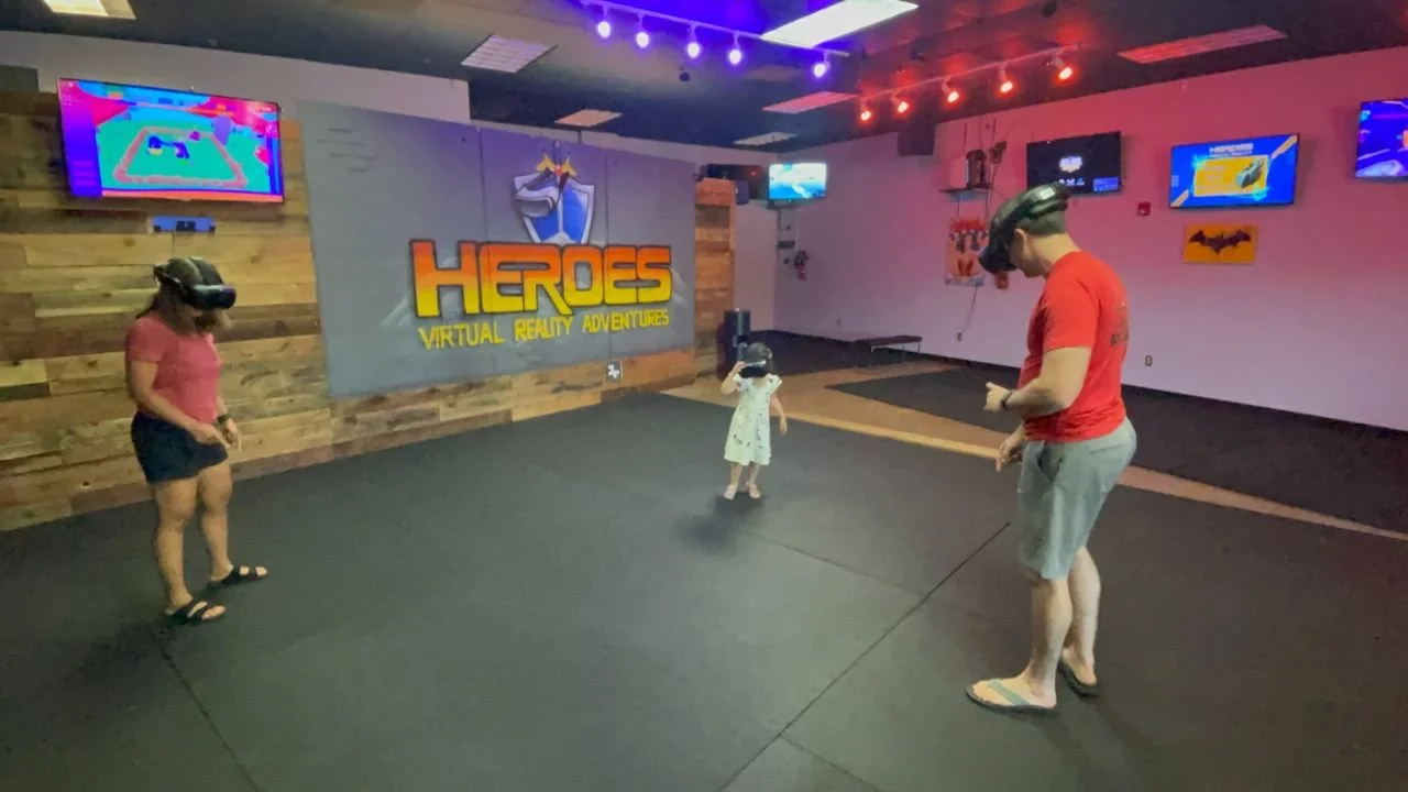 Family enjoying a shared virtual reality adventure