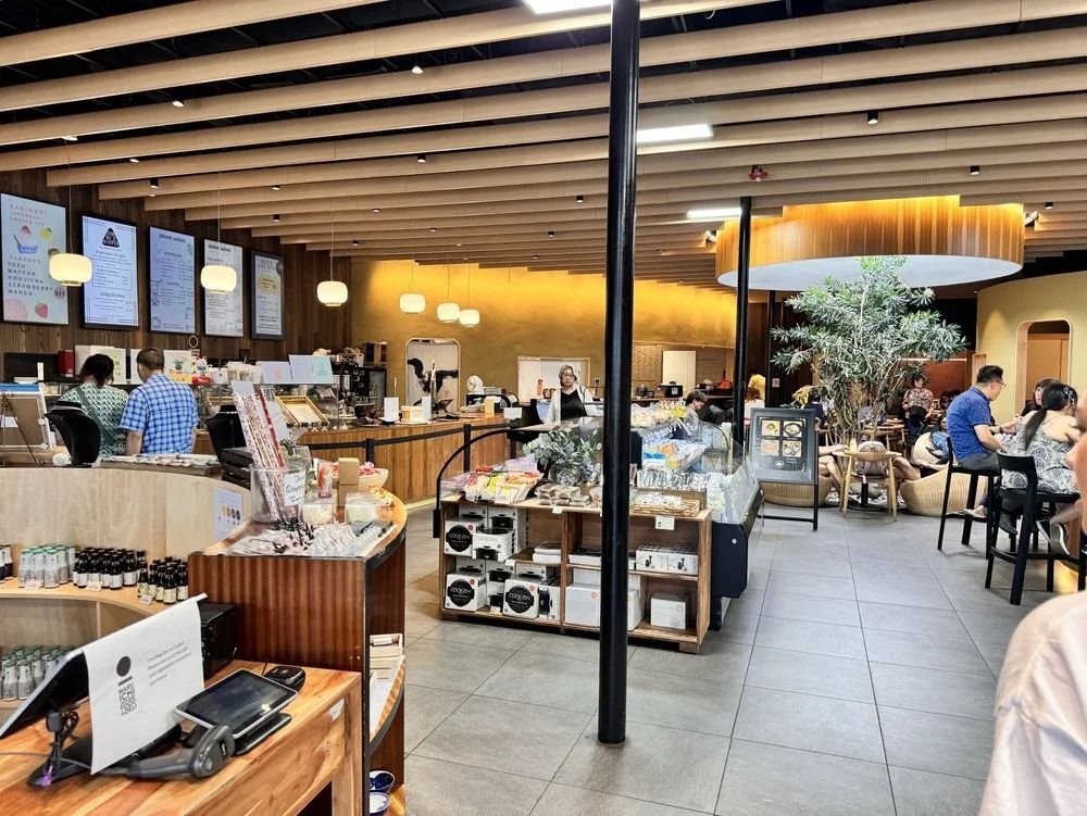 A perfect day in Coolidge Corner starts right outside your door. ☕ Begin with a latte and light bite at Maruichi Select&mdash;clean, cozy, and perfect for catching up with a friend. Take a stroll through Longwood Mall, a quiet stretch of green framed