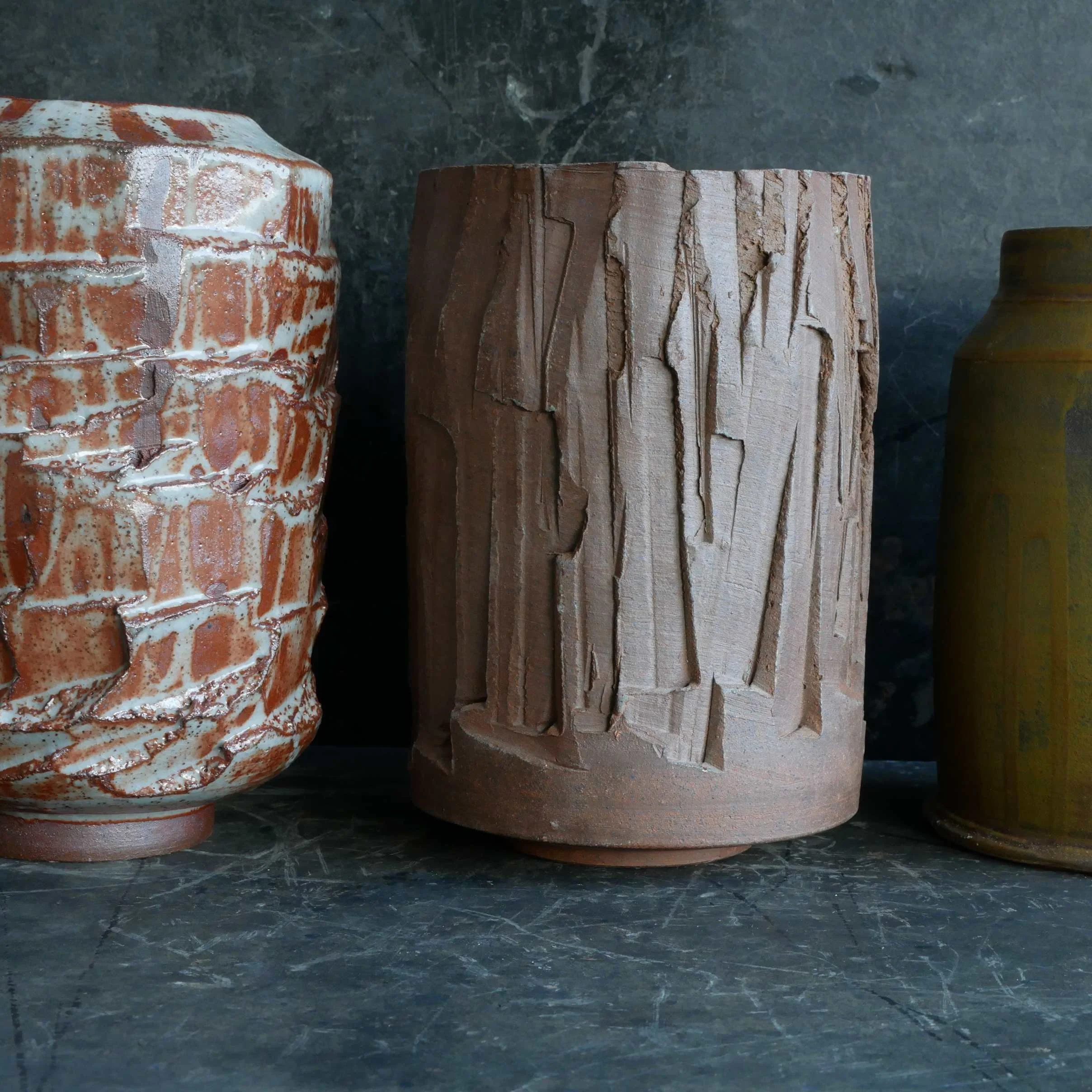 vases thrown on potters wheel with textured outer surface by Andy van Vliet