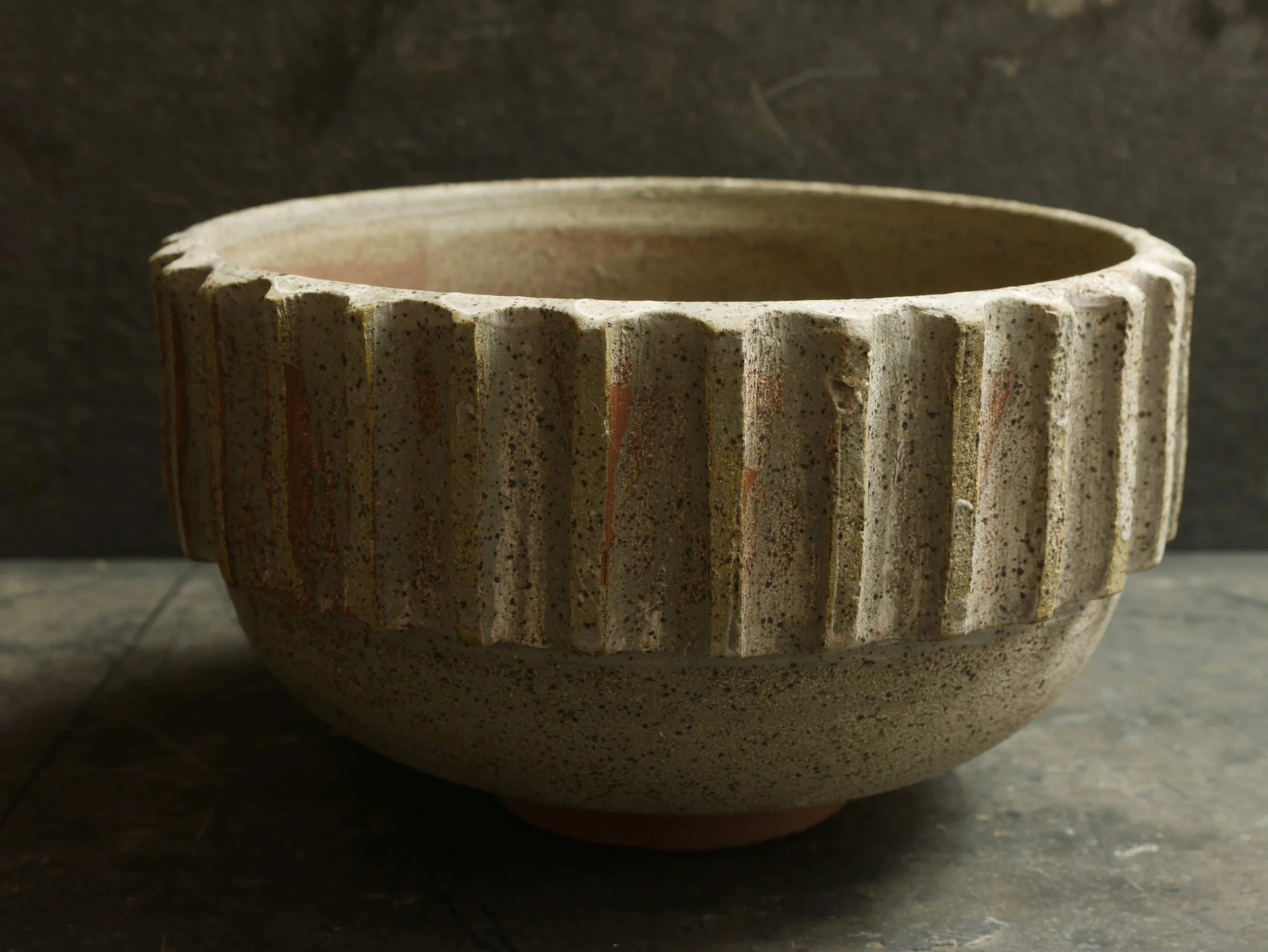 bowl with cog feature around rim by Andy van Vliet