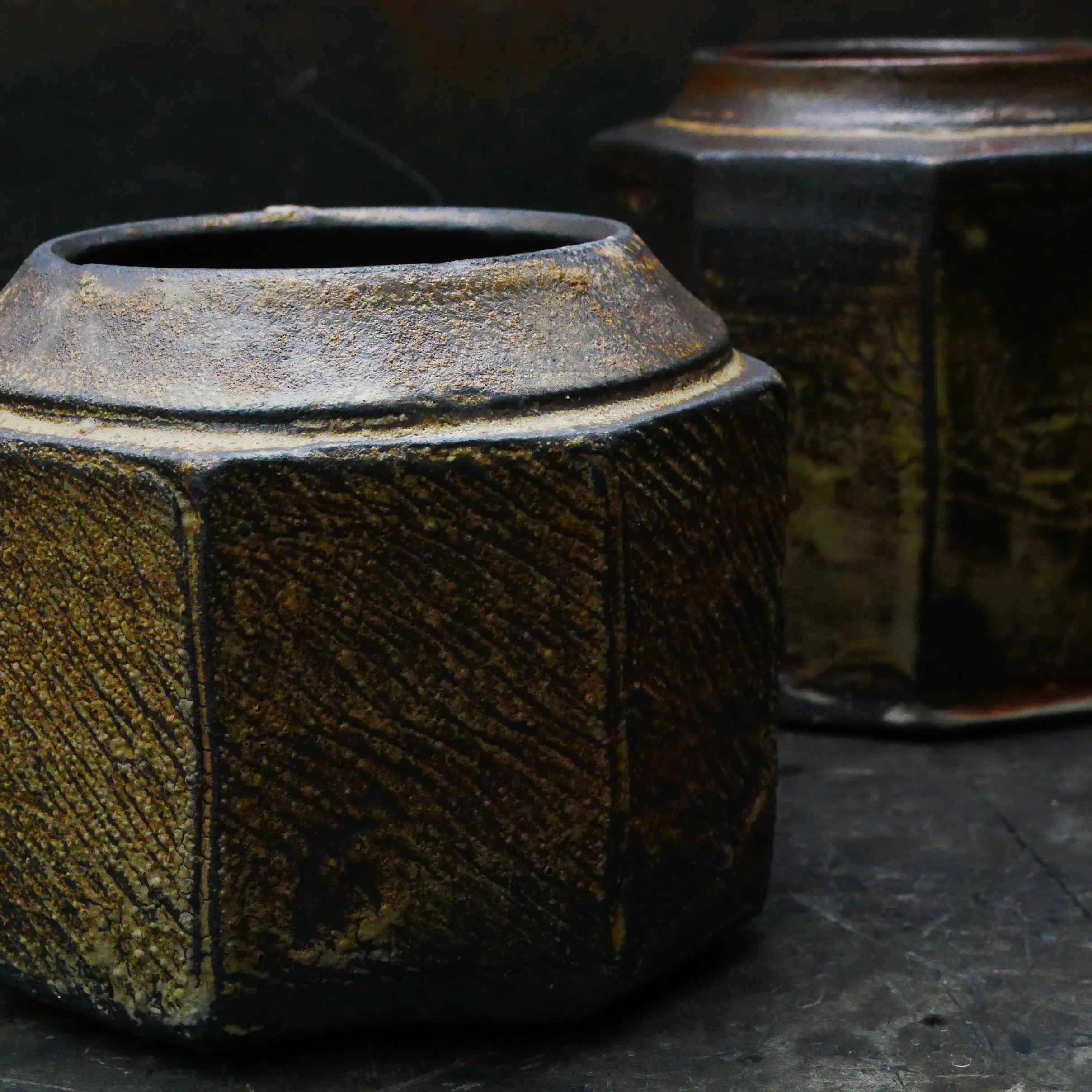 gold and brown facetted jar by Andy van Vliet