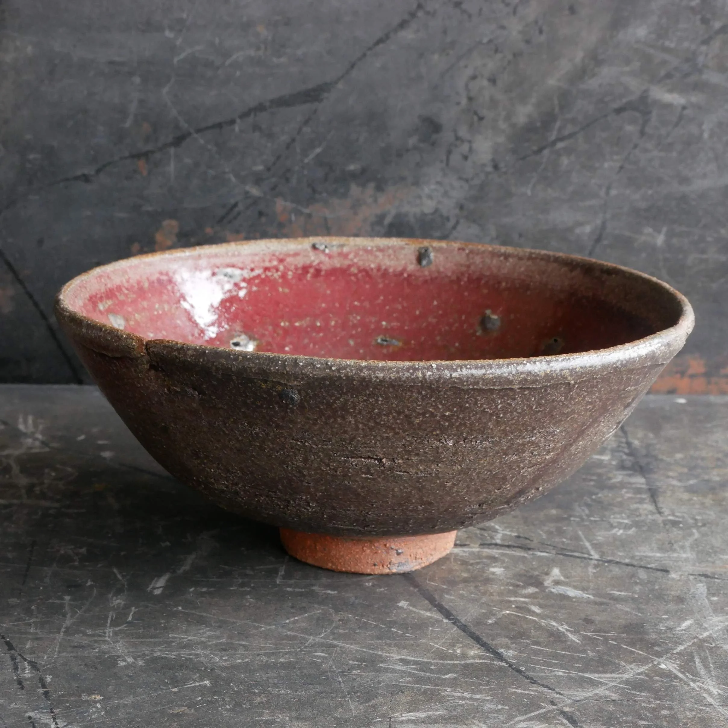 Japanese style bowl in reduction fired copper red glaze by Andy van Vliet