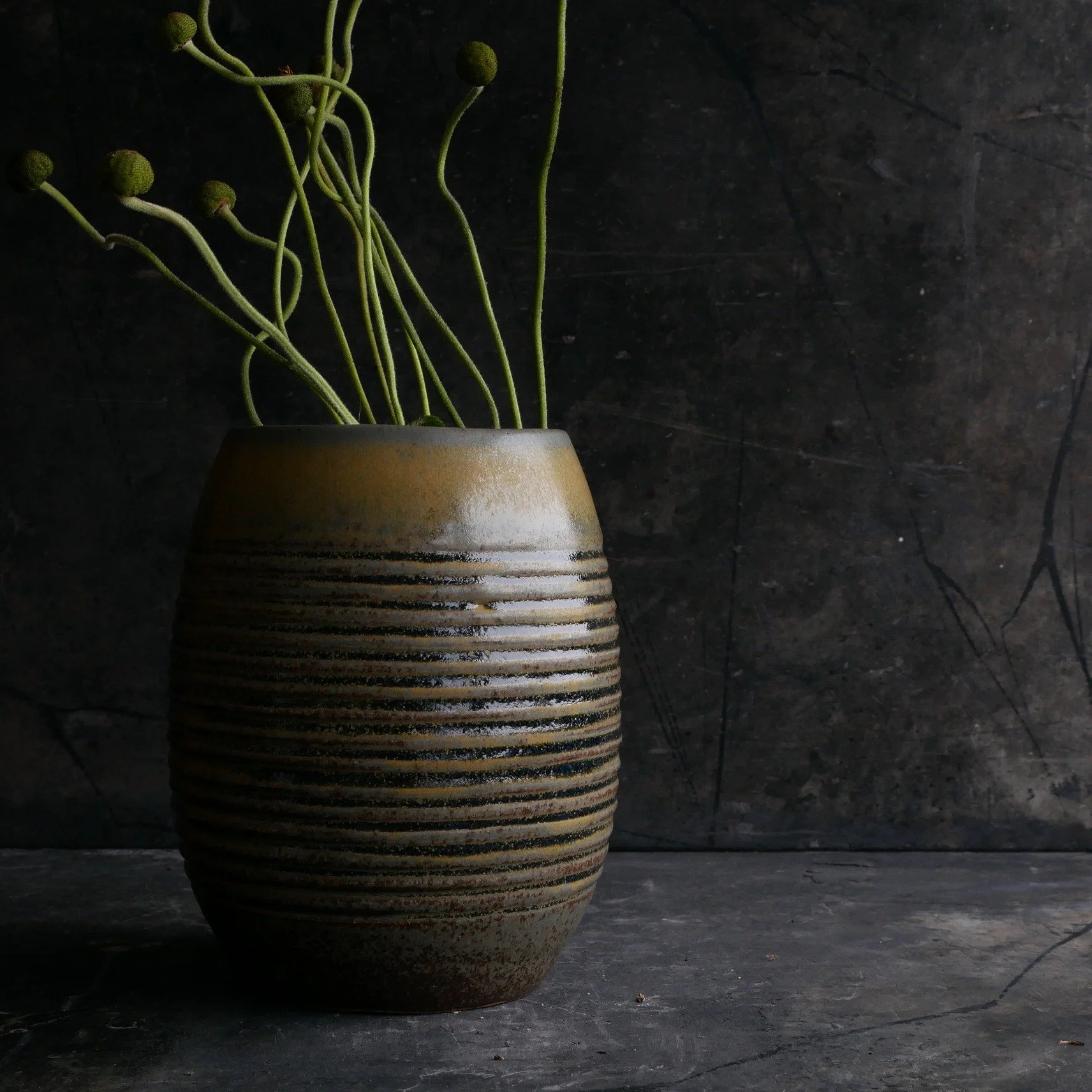 striped flower vase in blue and golden yellow colour by Andy van Vliet