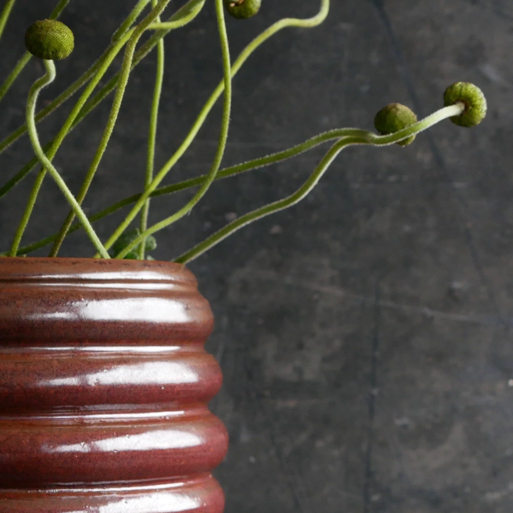 heavily profiled red vase by Andy van Vliet