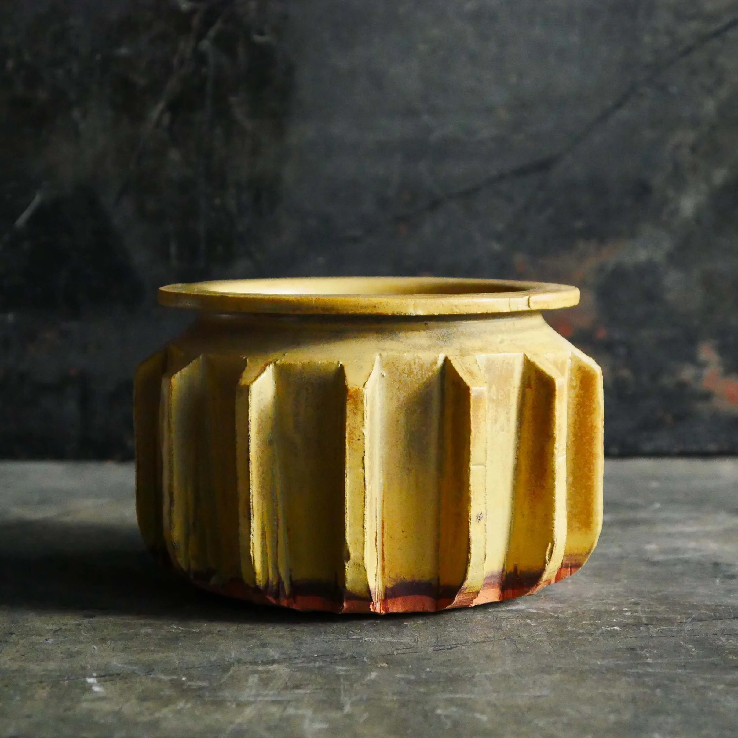 cog vessel in golden yellow by Andy van Vliet