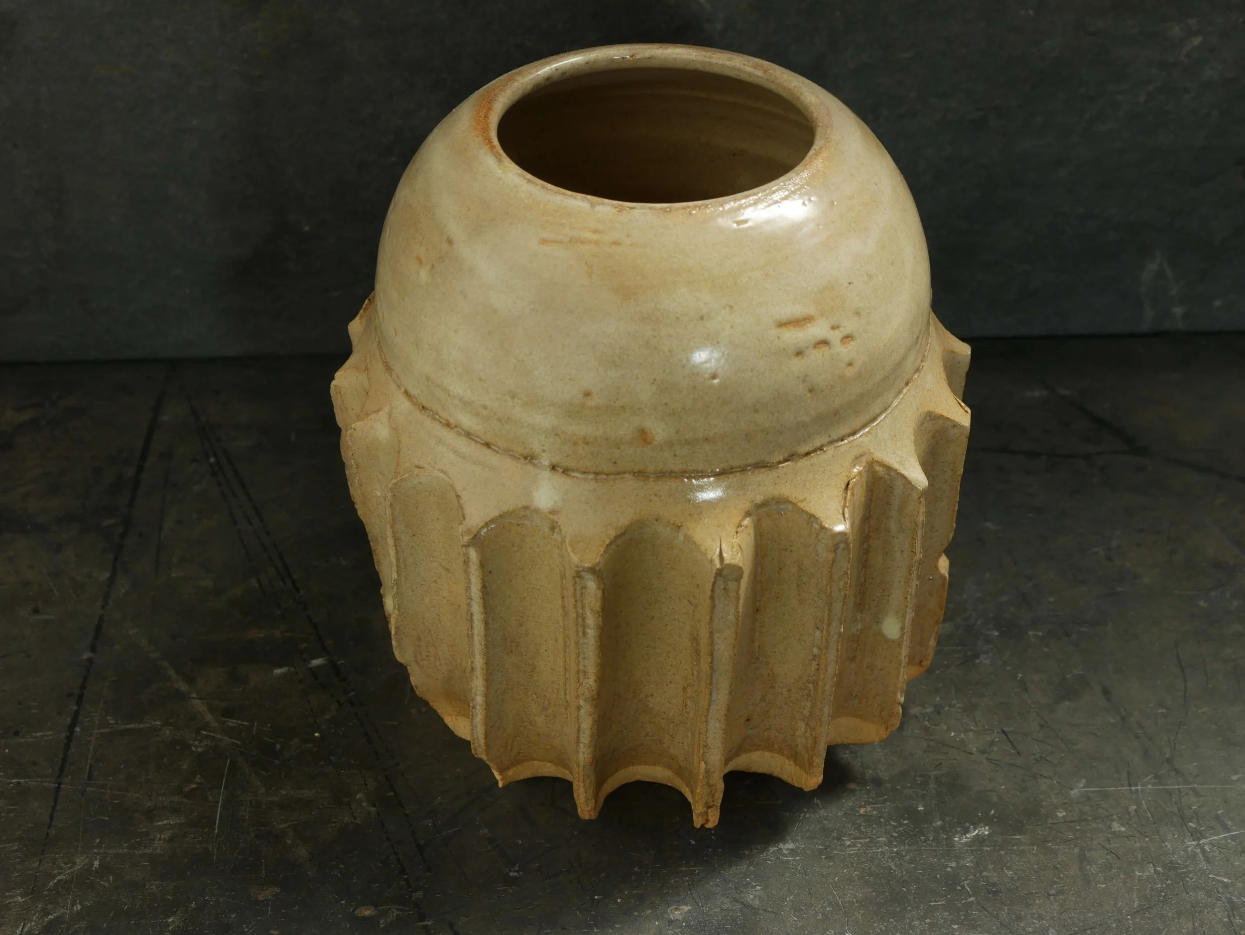 unique art object with cog feature and domed top by Andy van Vliet