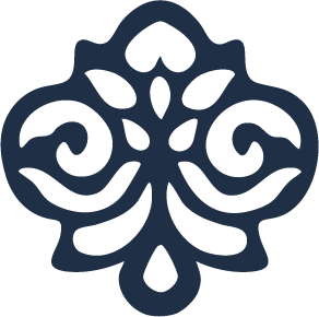 Black decorative ornament with symmetrical swirling patterns and a central heart shape.