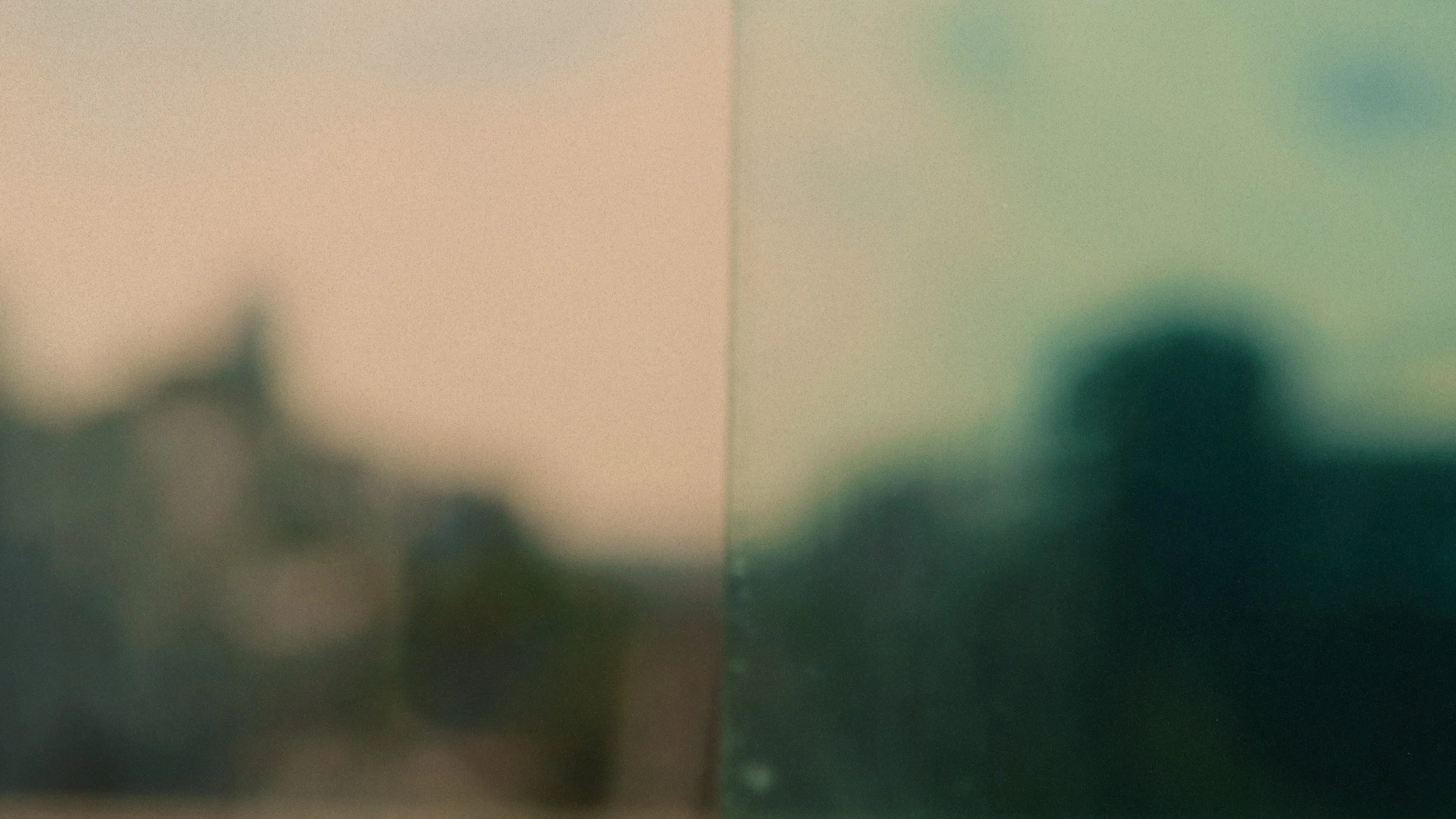 Side-by-side comparison of two blurry, abstract images with pastel colors and indistinct shapes.