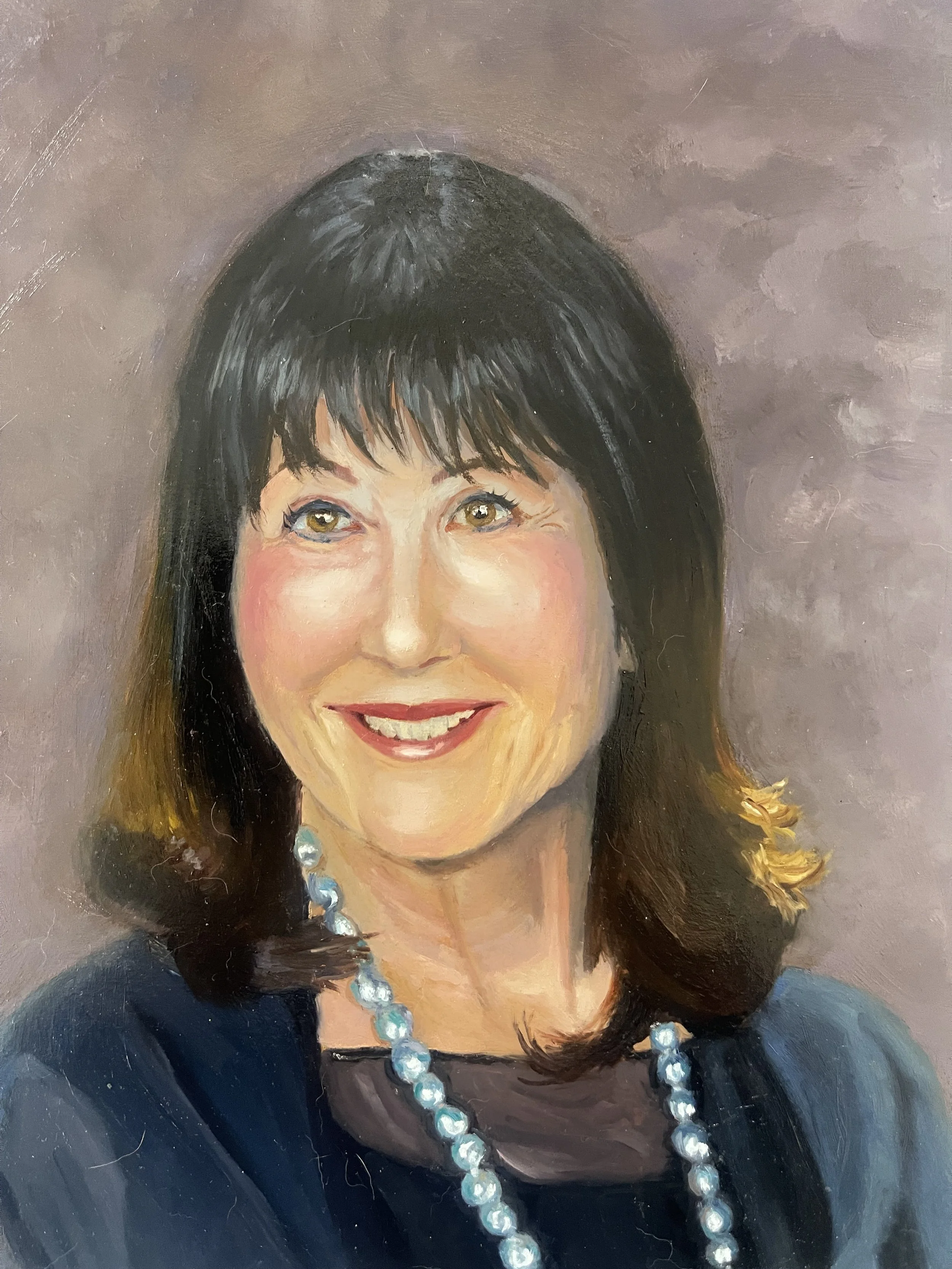 This portrait was commissioned by a very elegant woman.  I painted the portrait from a good reference photo that the patron supplied.  