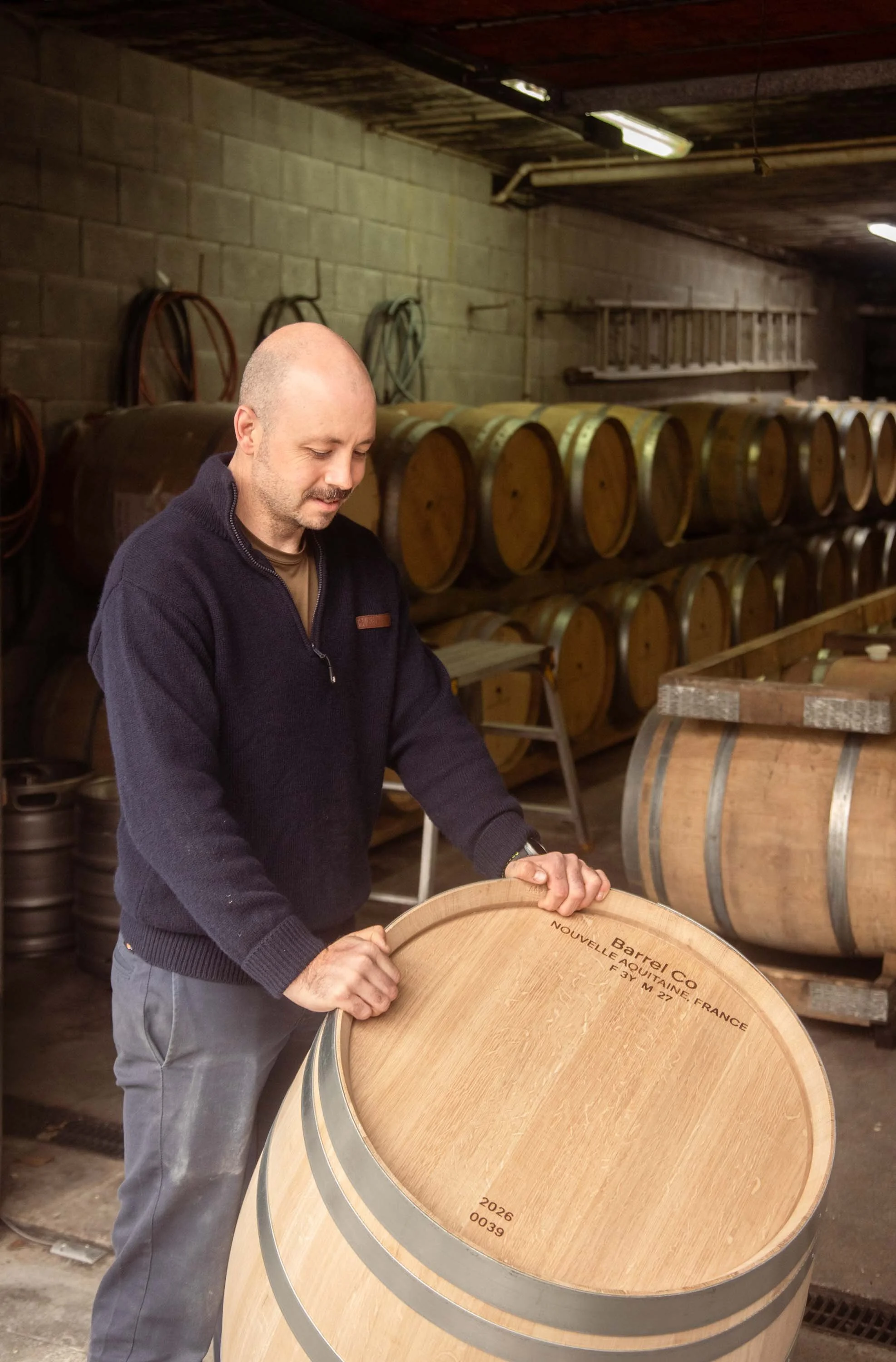 Winemaker with Barrel Co barrel