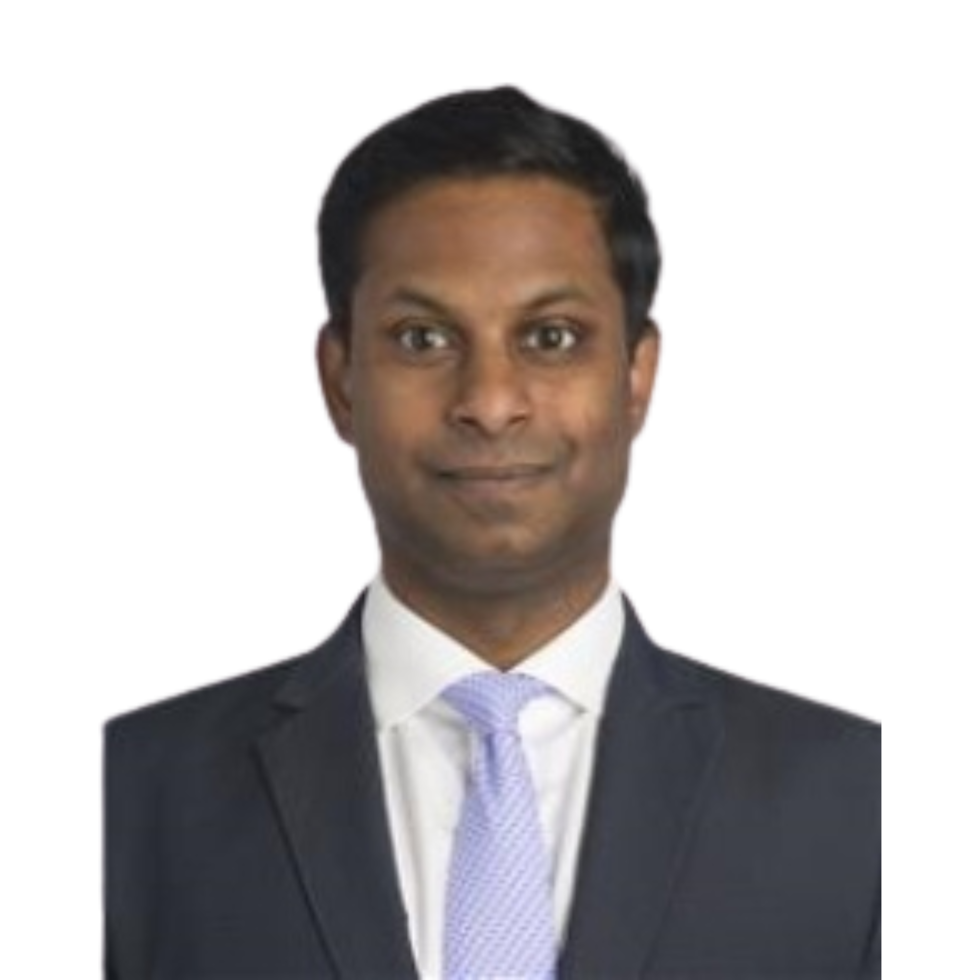 Professional headshot of a man in a dark suit, white shirt, and light-colored tie, with short black hair, against a plain background.