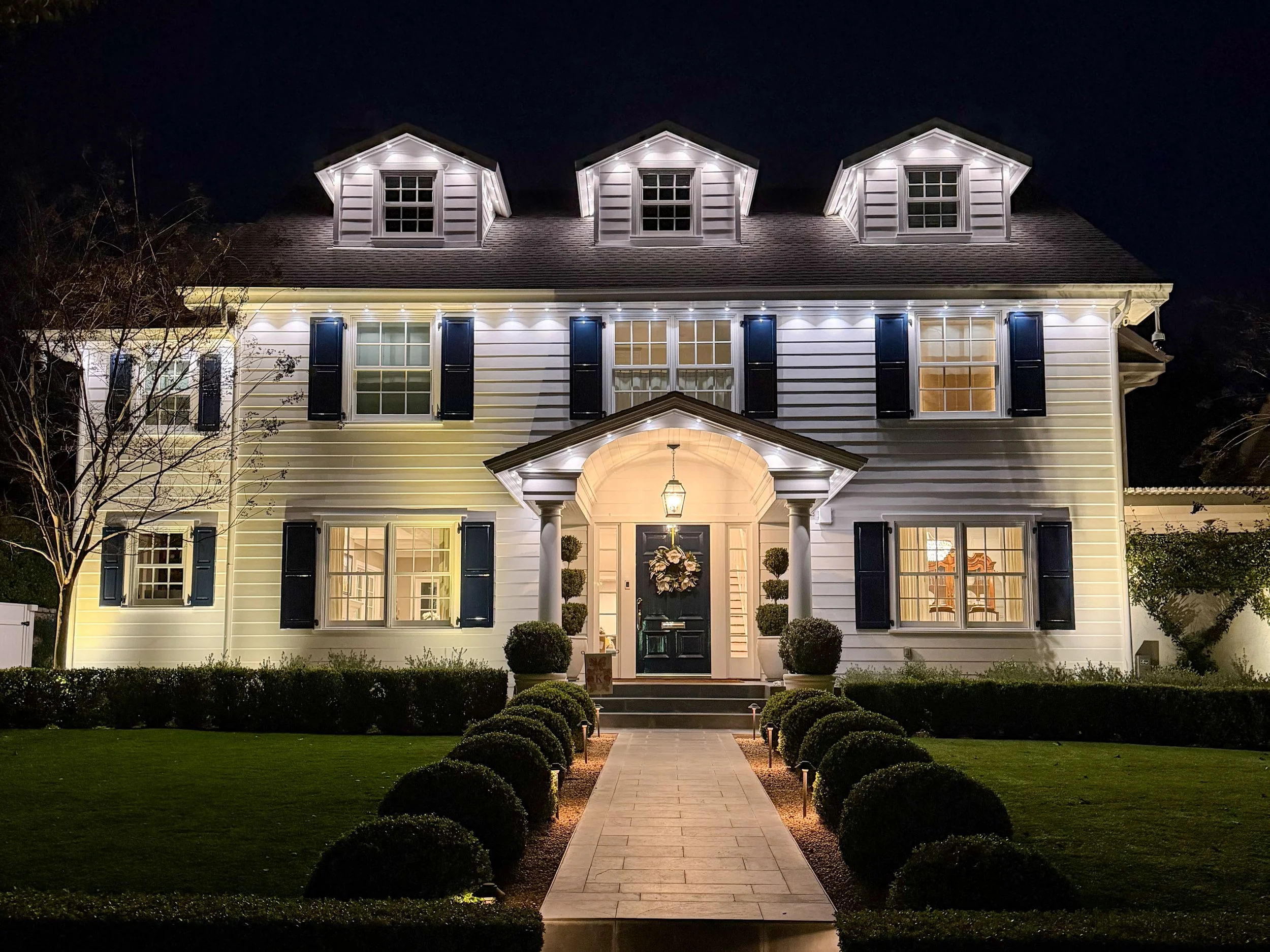 Custom Govee smart lighting installation on a Pasadena home, Los Angeles, with LED strips highlighting architectural features and creating a vibrant, modern look.