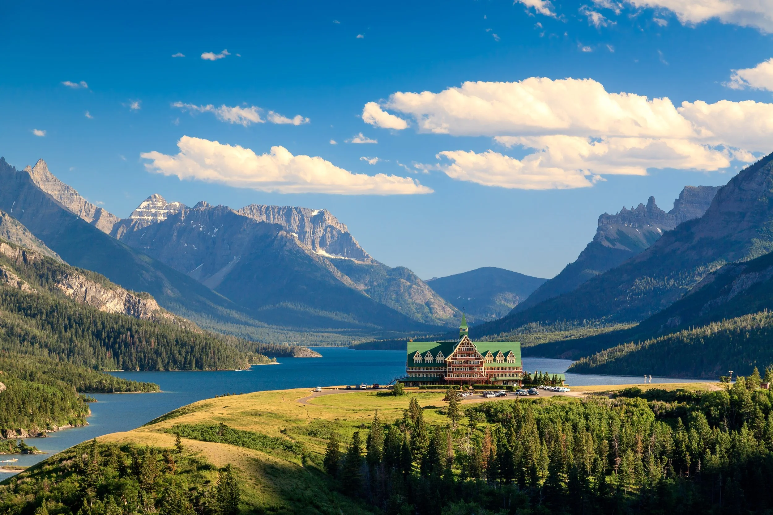 Prince of Wales Hotel on a blue lake in Waterton, AB