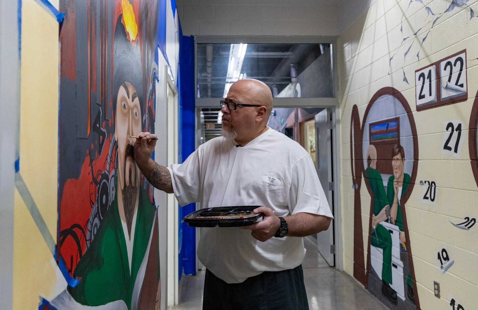 He wants to ‘thrive’ in prison. This years-long mural project helps him do that