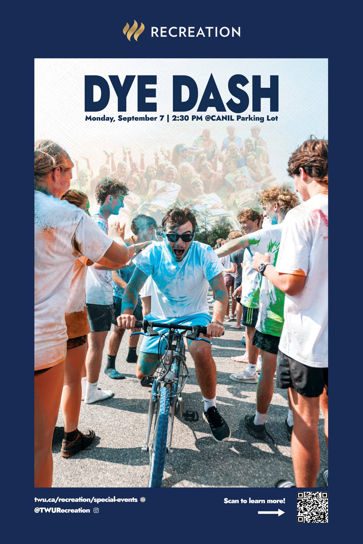 A group of young people celebrating Holi with colored powder, with one person on a bicycle in the center, at a colorful outdoor event.