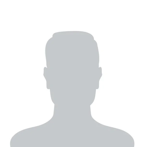 Silhouette of a person's head and shoulders in gray.