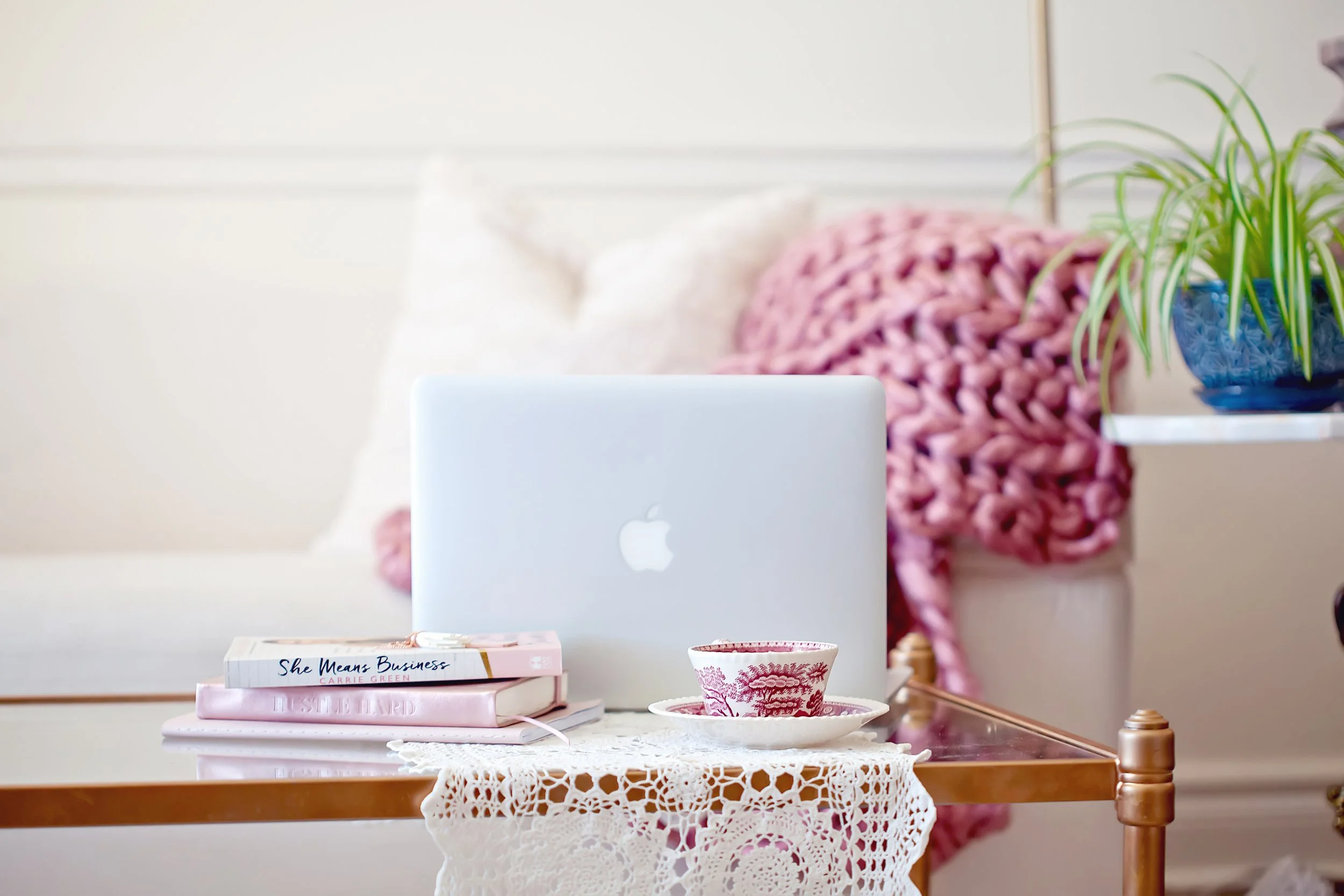 Woman delegating creative tasks, small business owner getting support with Canva and content writing.”