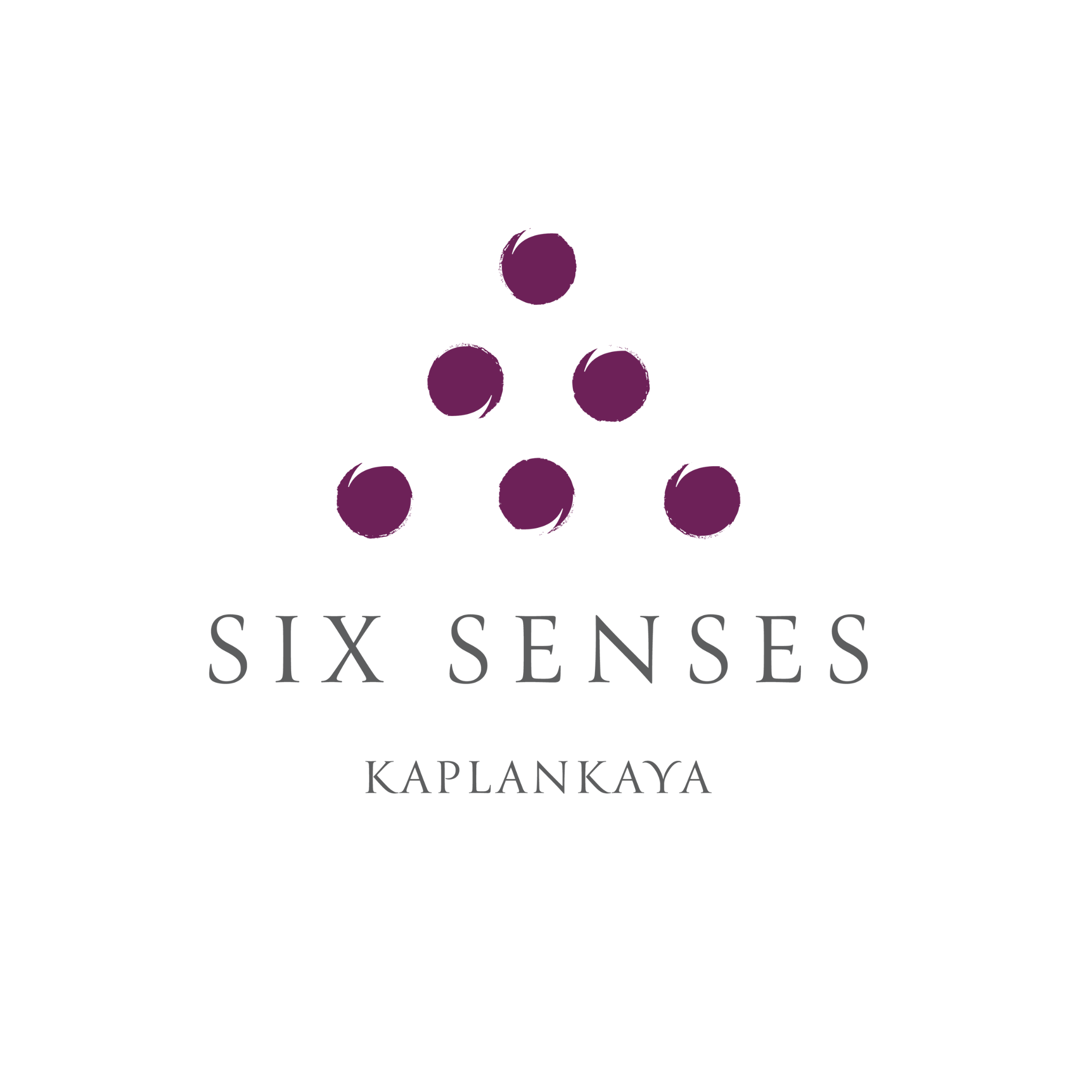 Logo for Six Senses Kaplankaya featuring six purple circles arranged in a triangular pattern above the text