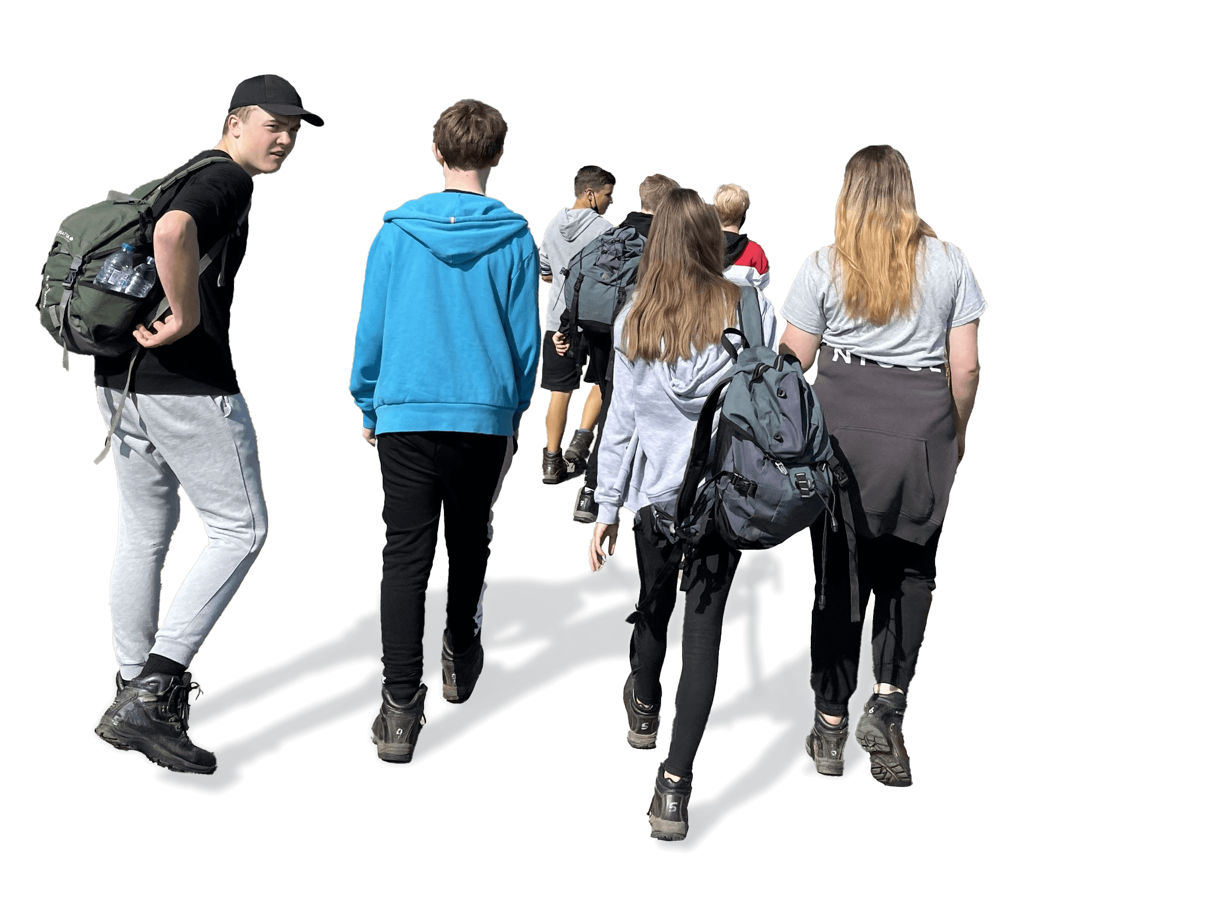 A group of young people with backpacks and outdoor clothing walking together.