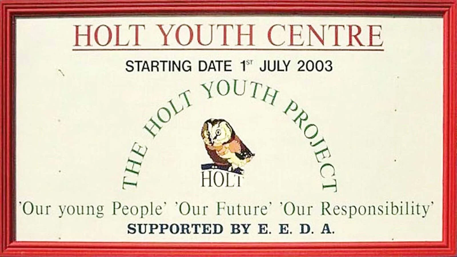 Sign for Holt Youth Centre with a drawing of an owl, supporting the project, starting July 1, 2003, with the focus on young people, the future, and responsibility.