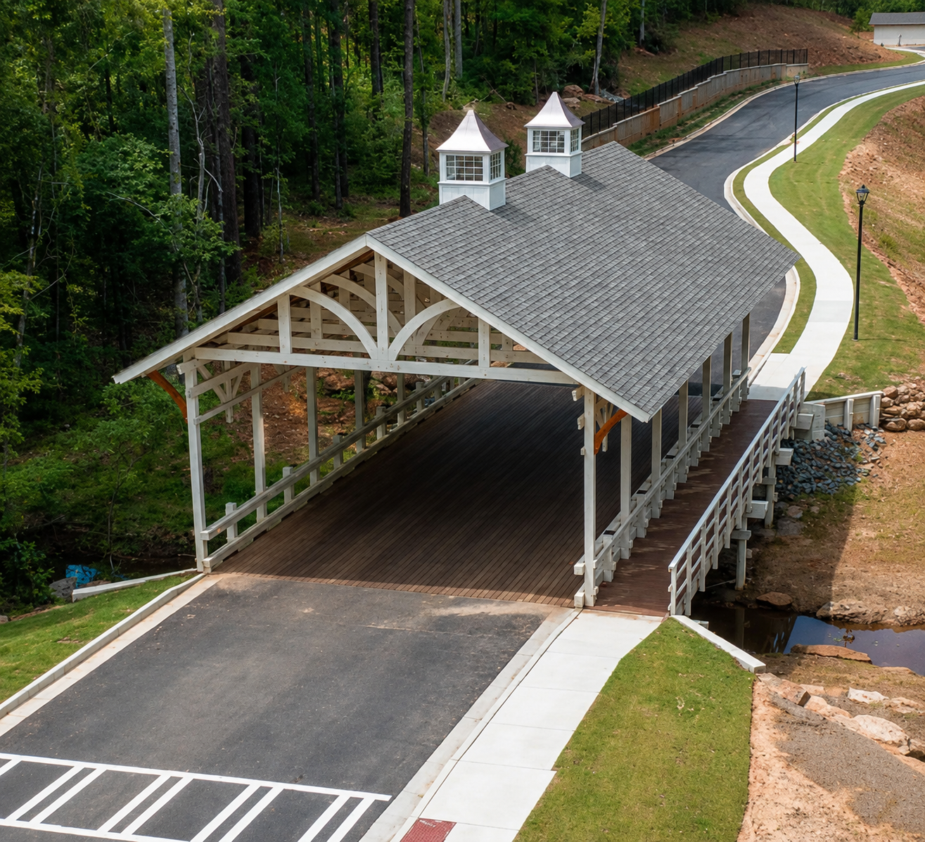 Laminated vehicular bridges construction