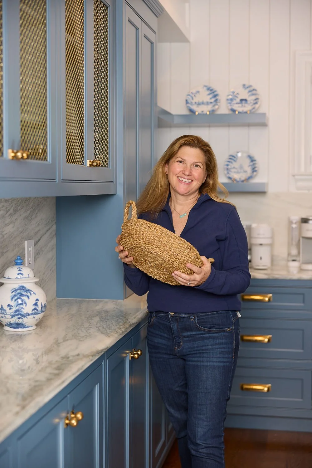 Merrie Deitch of The Tidy Girl organizing a client's home in the Greater Boston area