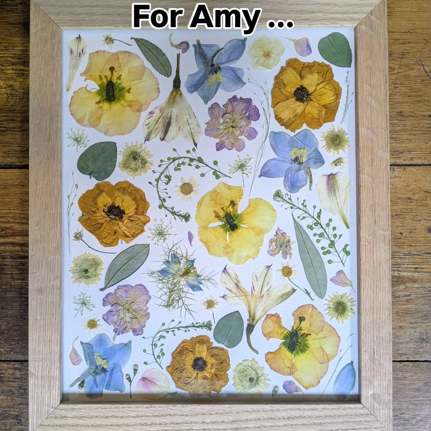 Amy&rsquo;s bouquet ✨ beautifully pressed in a 10x8 inch oak frame &mdash; a wedding day keepsake made to last. 🌸💍