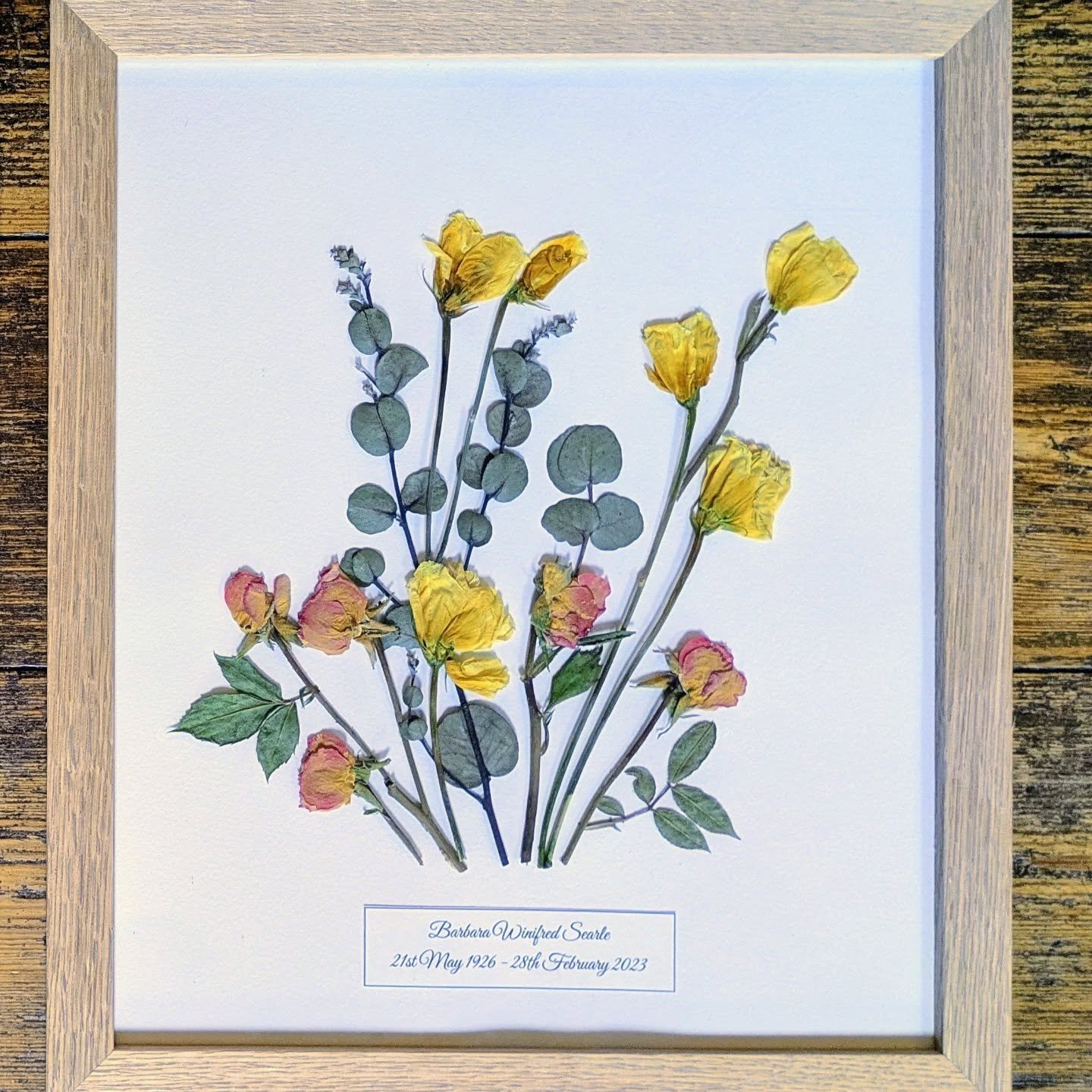 Jo's memorial flower frames in a simple, 10 x 12 inch solid oak frames.