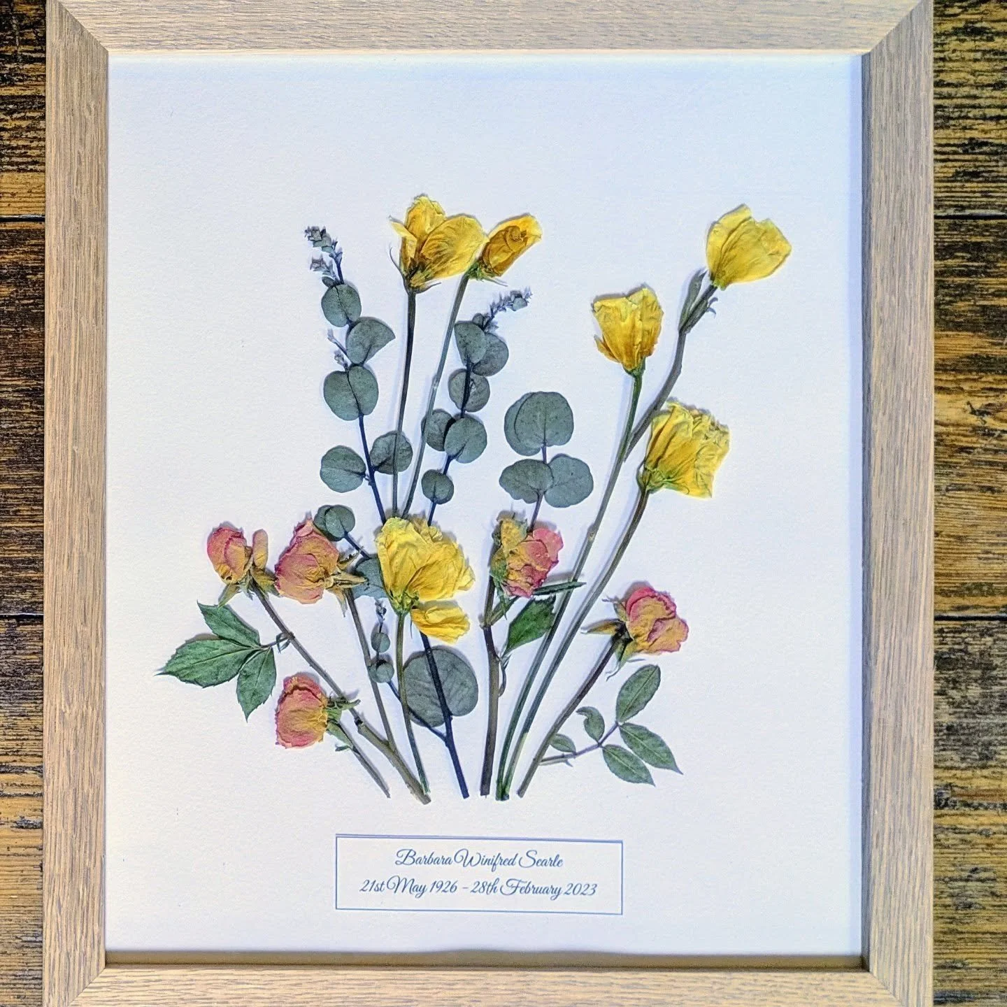 Jo's memorial flower frames in a simple, 10 x 12 inch solid oak frames.