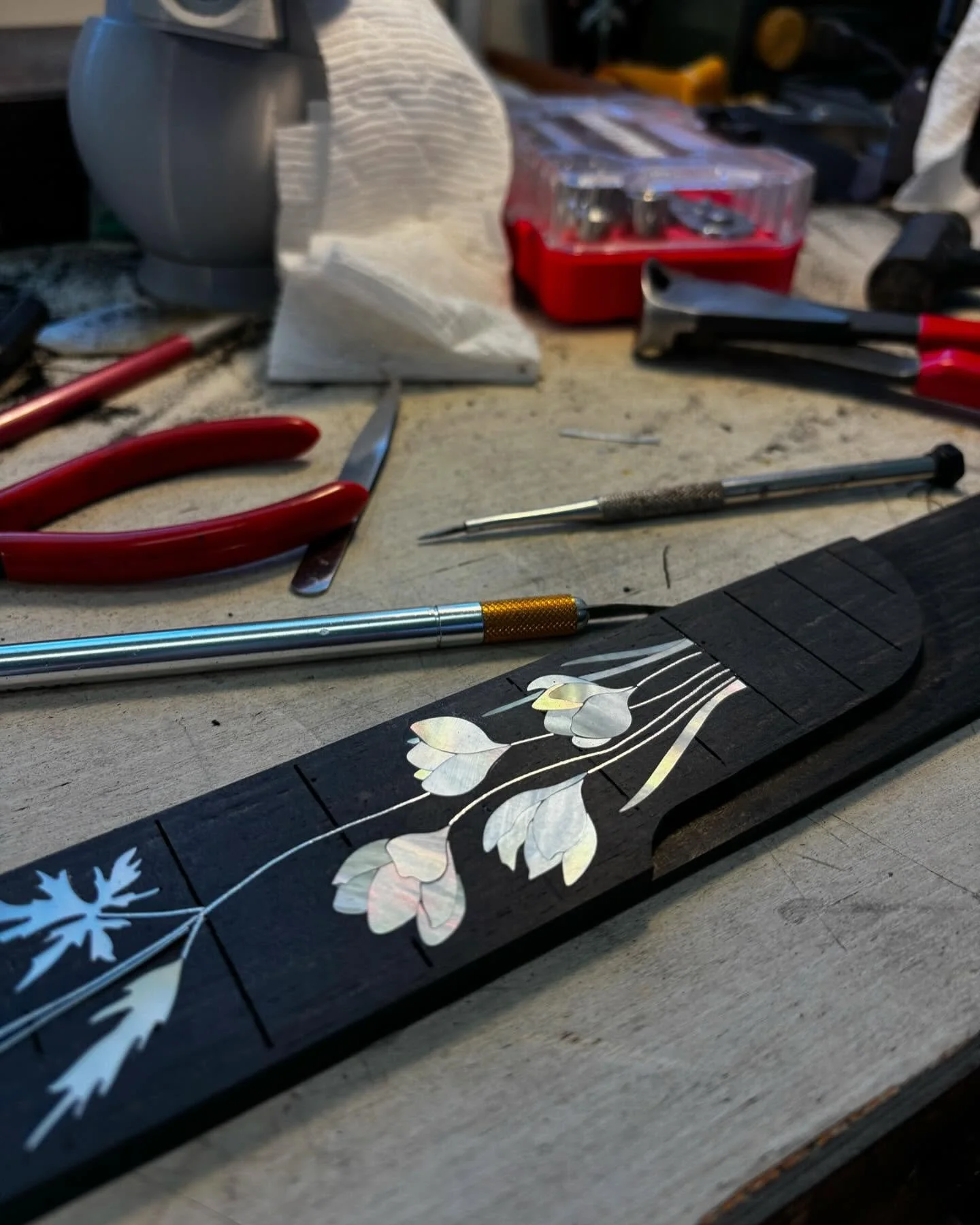 Working on some inlays today. #crocus #banjo #luthiery #inlay