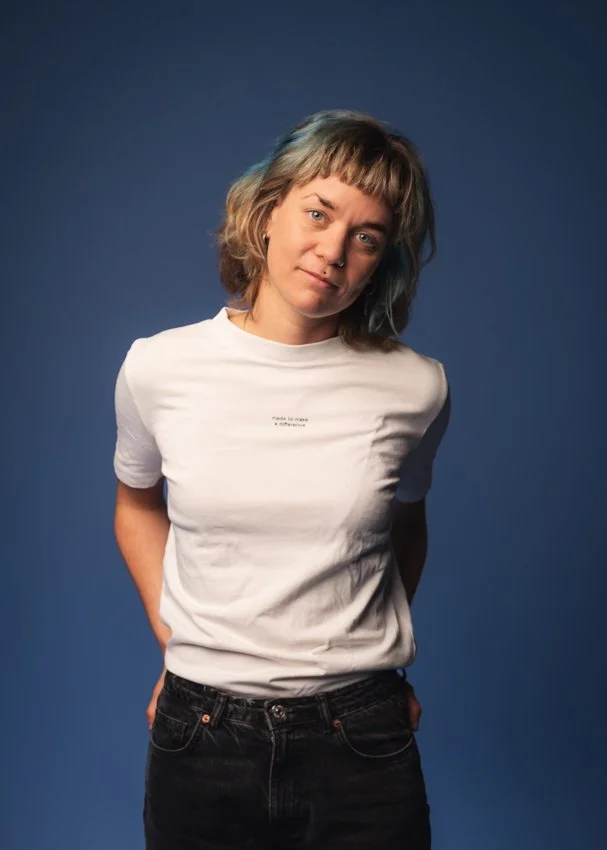 Anja Bauer, founder of Cosmic Company, smiling in a professional setting