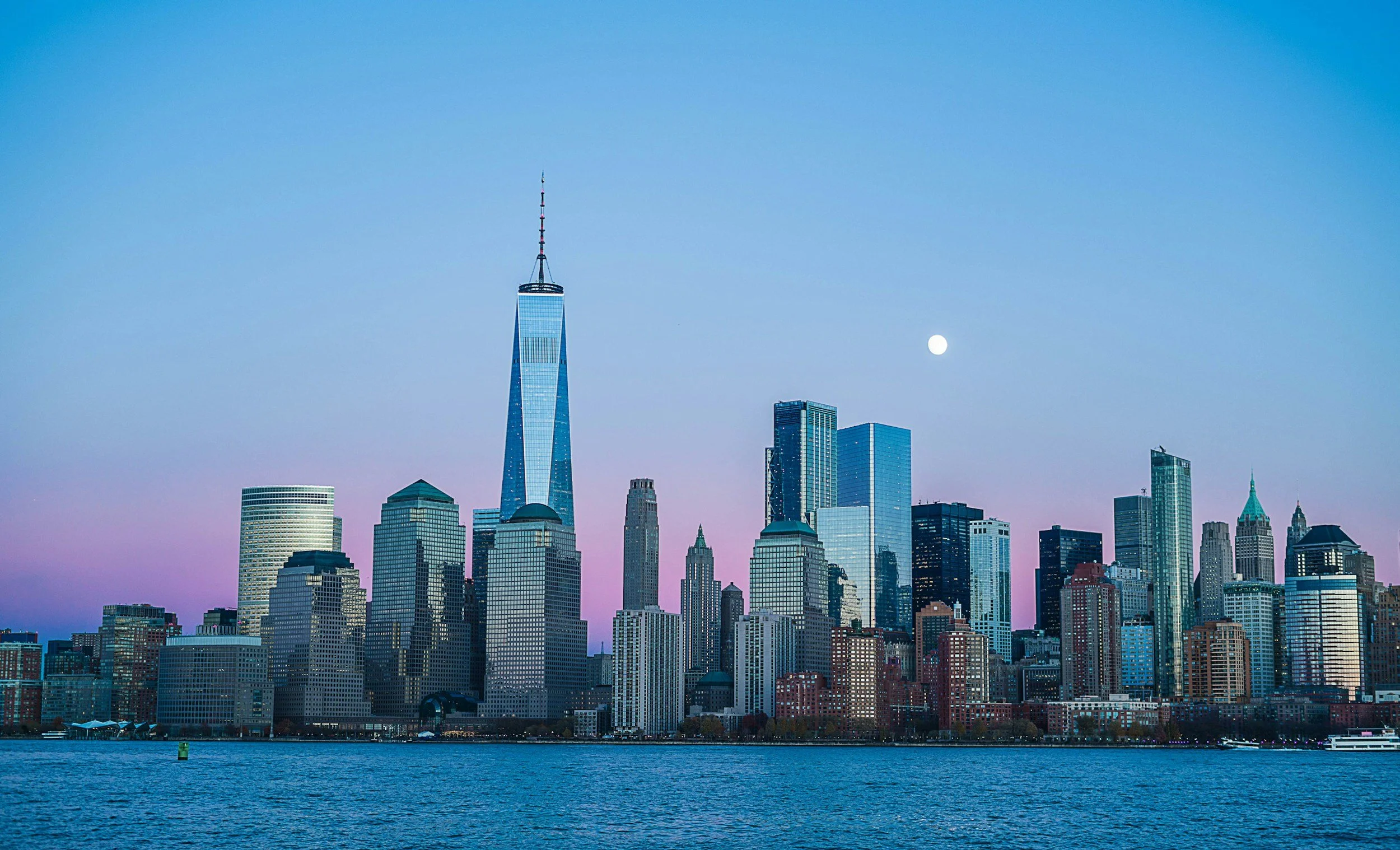 New York City skyline glowing at twilight
