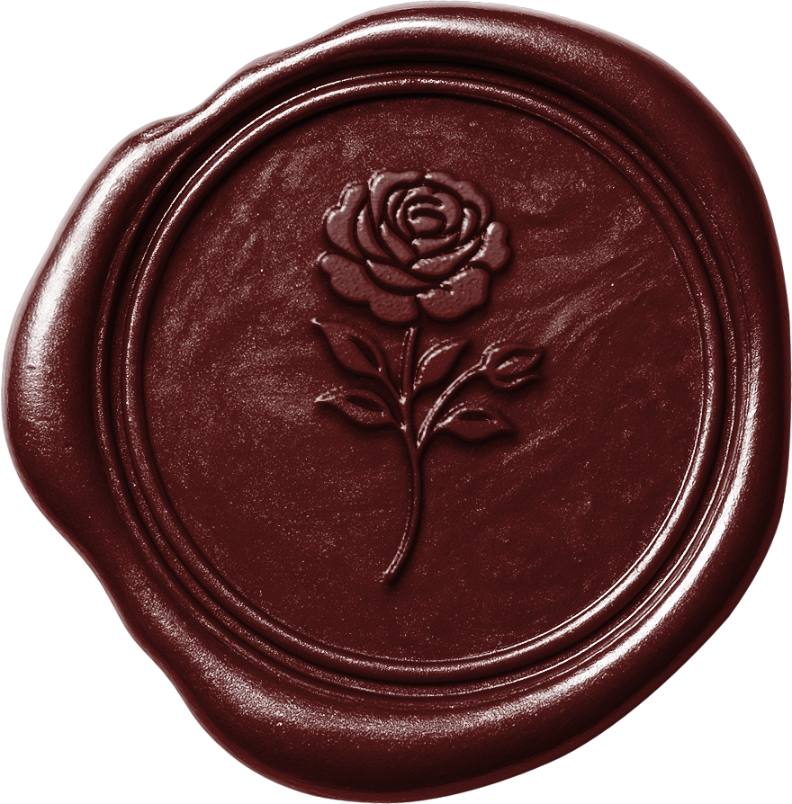 A red wax seal with a carved rose design in the center.