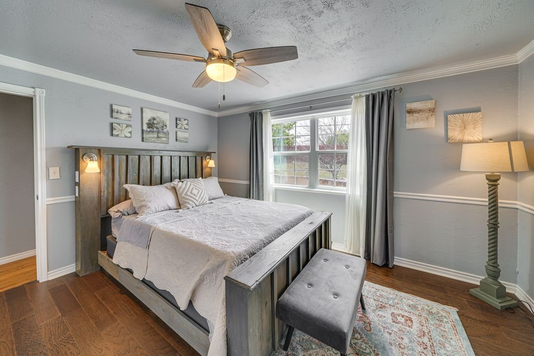 Bedroom 1 with queen bed and ample closet space