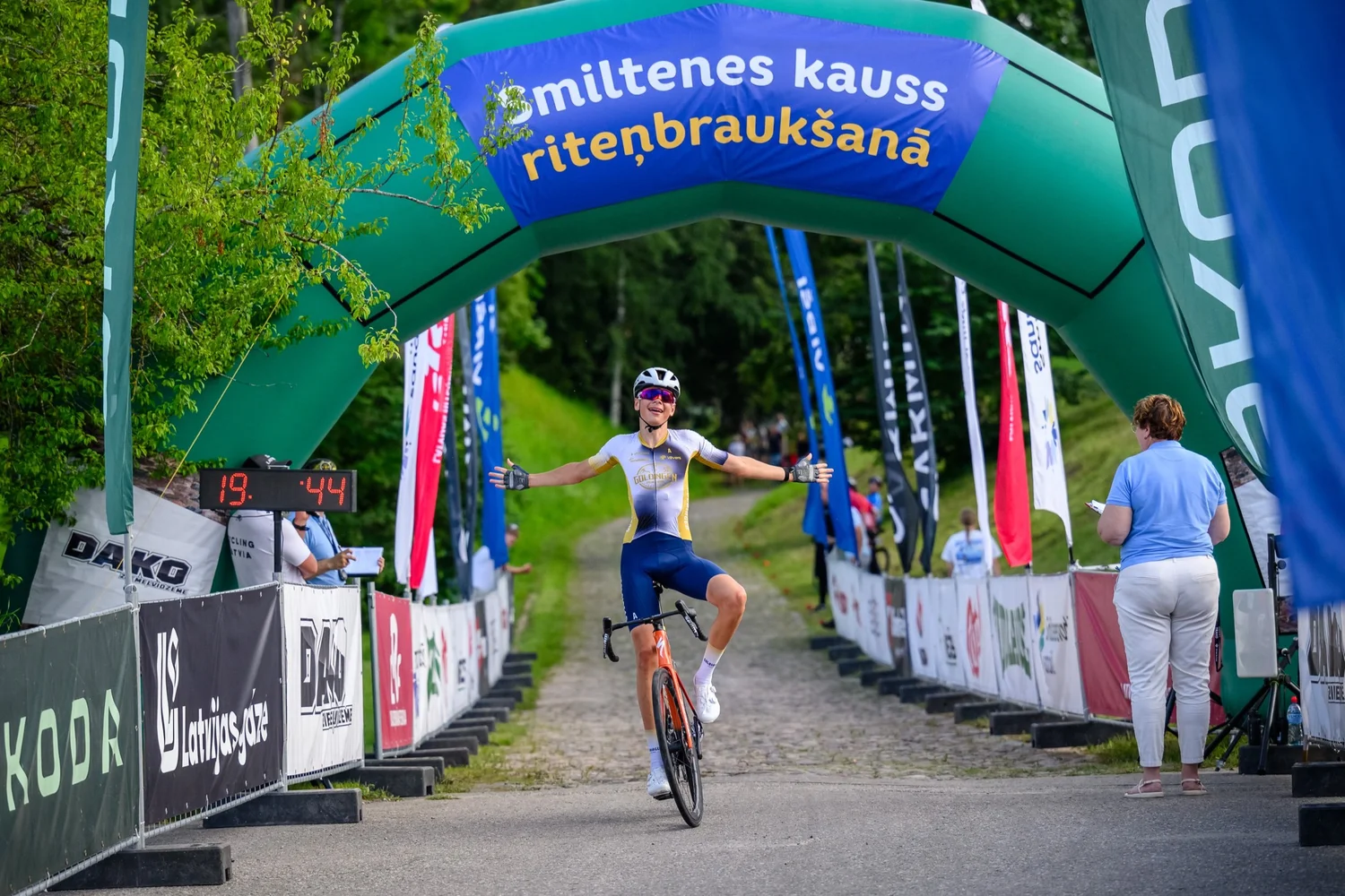 Junior rider celebrating at the finish of Smiltenes kauss