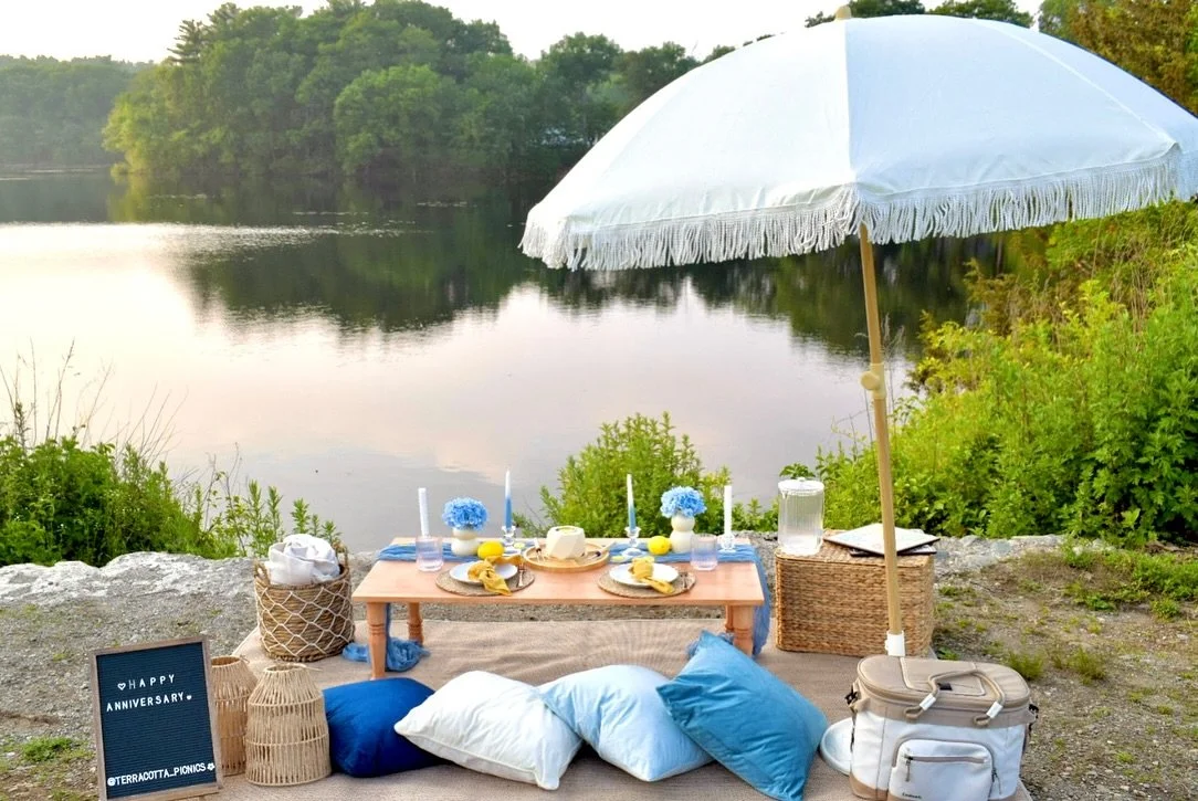 A sunset in the lake and this beautiful picnic set up is all you need 🩵