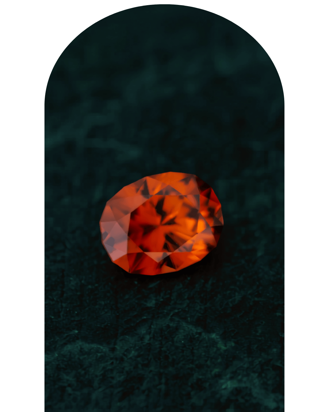 Un rubis orange vif posé sur une surface sombre.