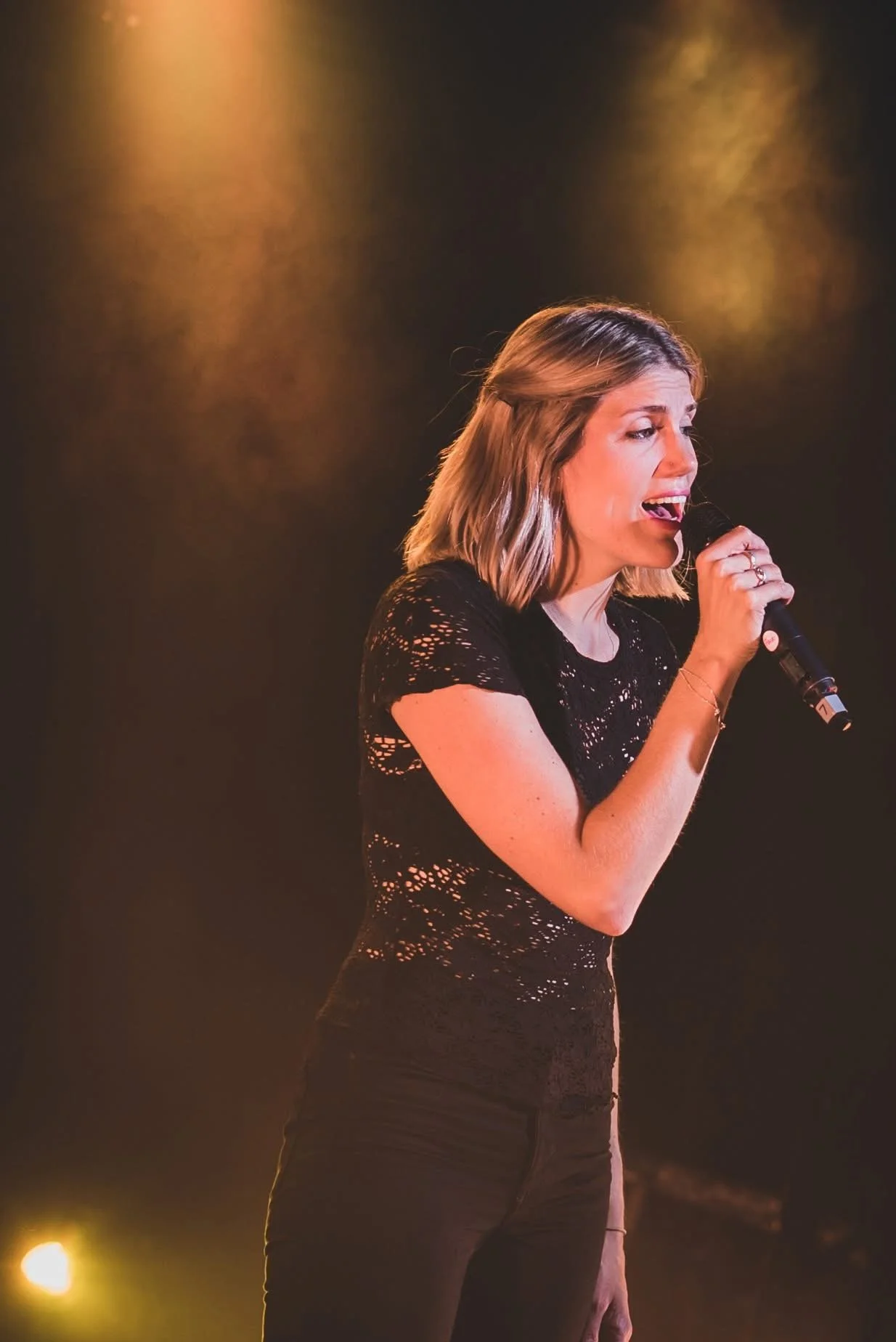 Adam Street singers Lucy Mitchell singing- UK choir of the year fundraising concert for amateur choral competition london