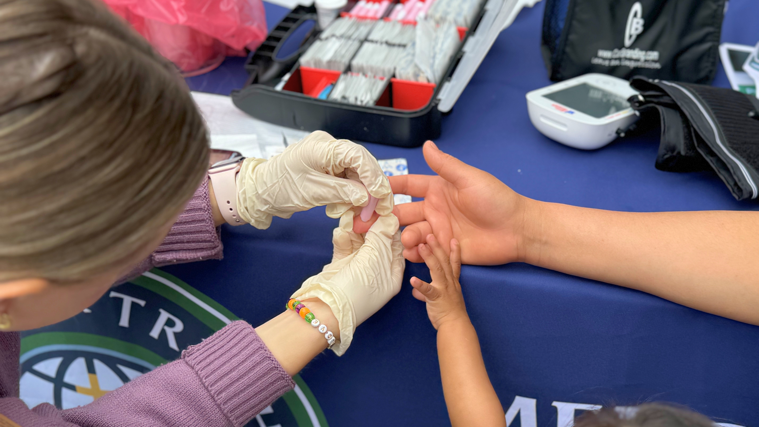 Diabetes Screenings underway for a Mercy & Truth outreach event in the Kansas City Metropolitan area.
