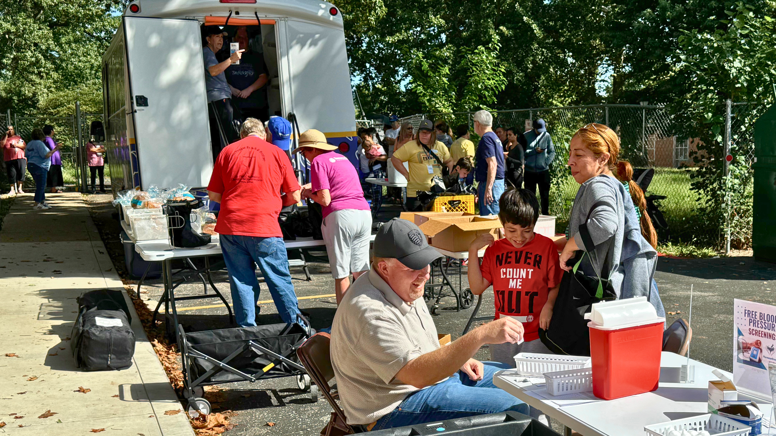 Mercy & Truth offers free food to neighbors in need during our monthly food pantry events at our KCK Clinic.