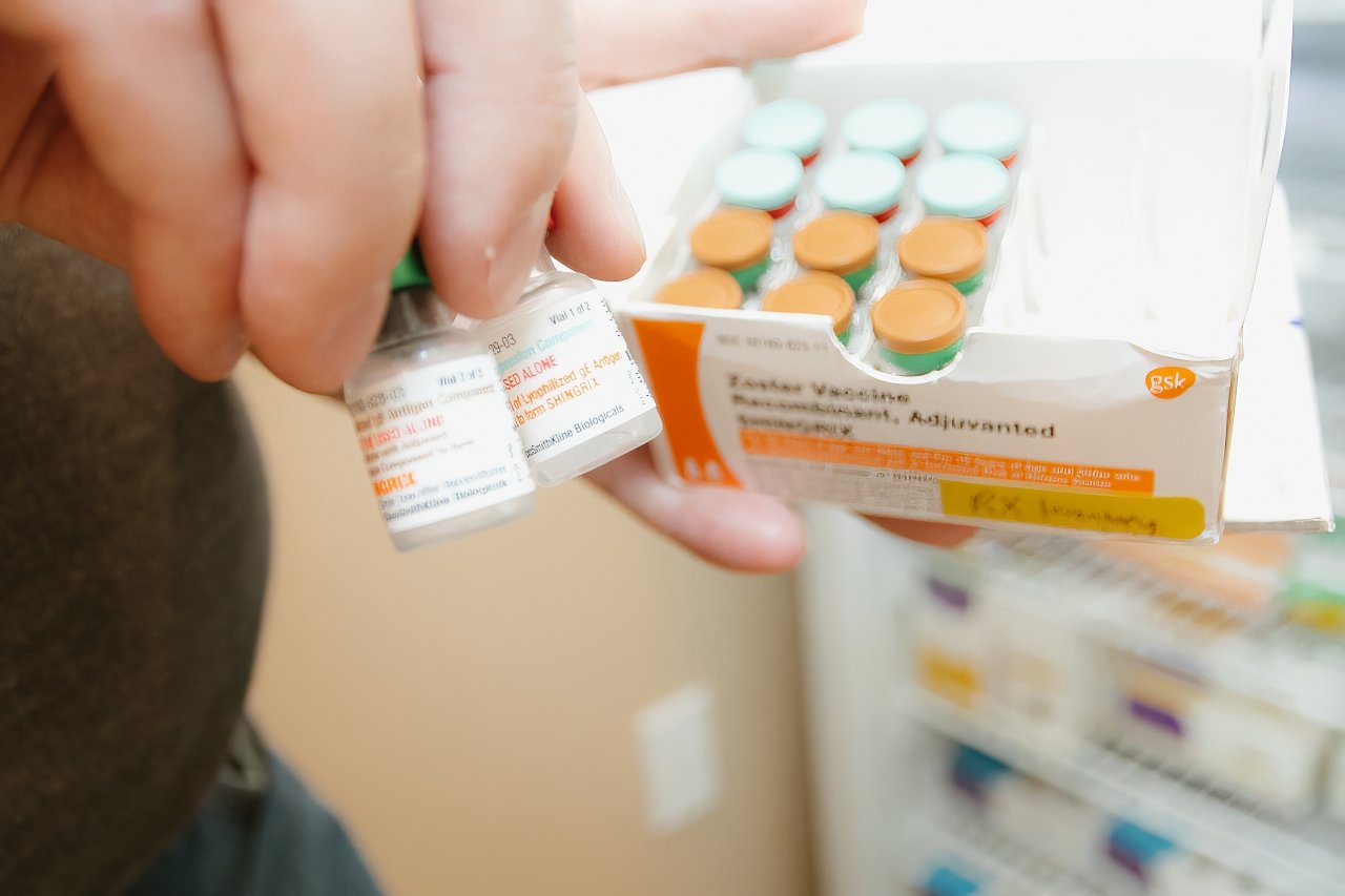 Pharmacy technician carefully verifying medication orders as part of Mercy & Truth’s commitment to accurate patient care.