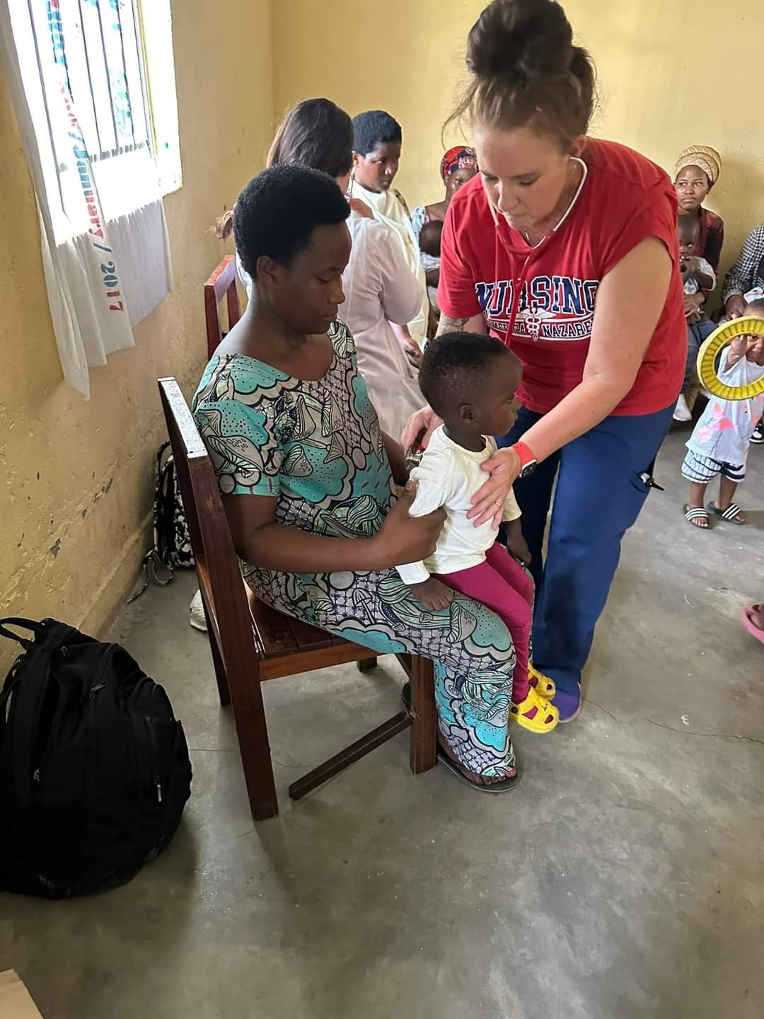 Volunteers and medical staff from Mercy & Truth Medical Missions providing Life-Changing Care and spiritual support during an international trip.