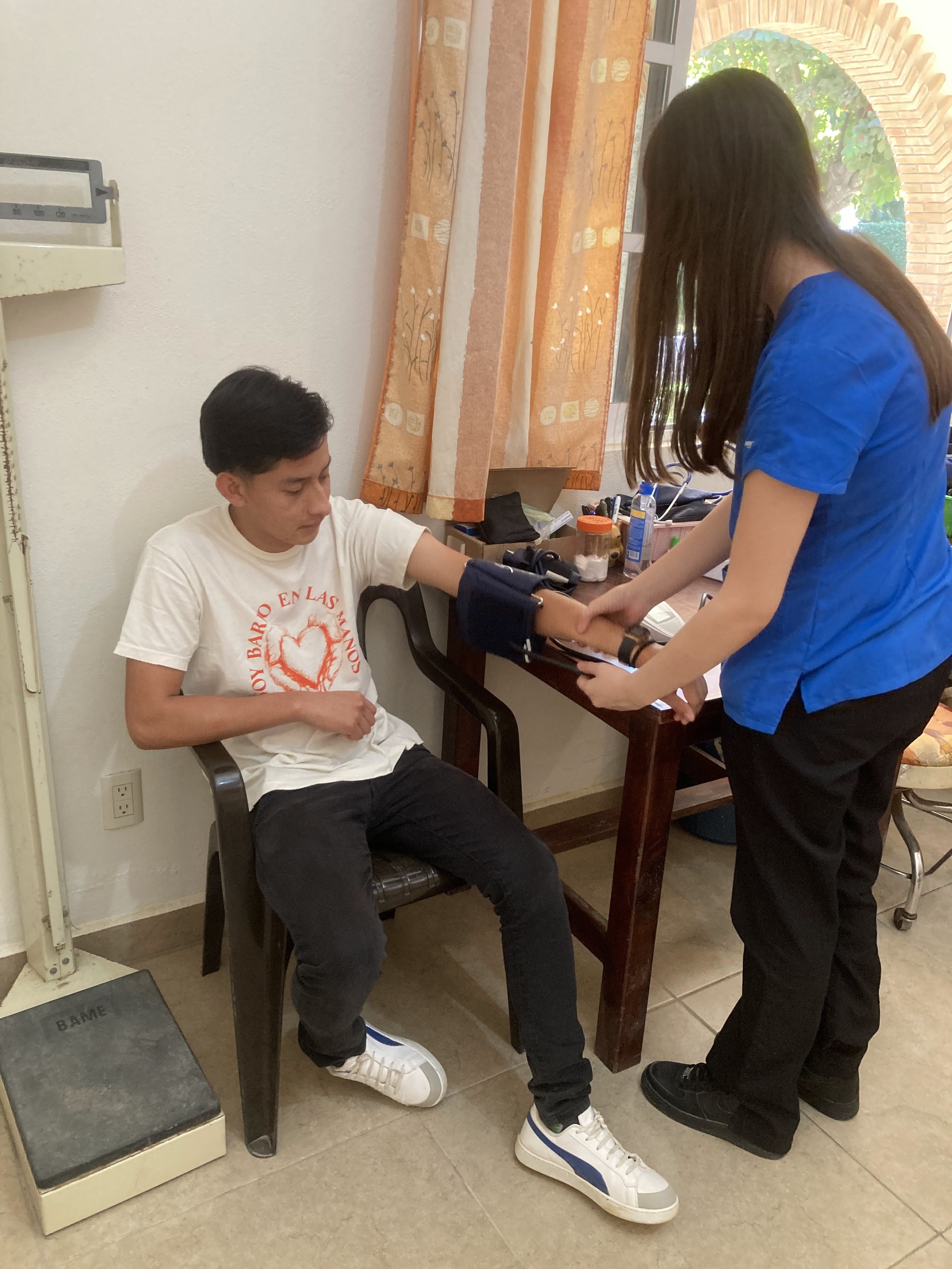 Volunteers and medical staff from Mercy & Truth Medical Missions providing Life-Changing Care and spiritual support during an international trip.