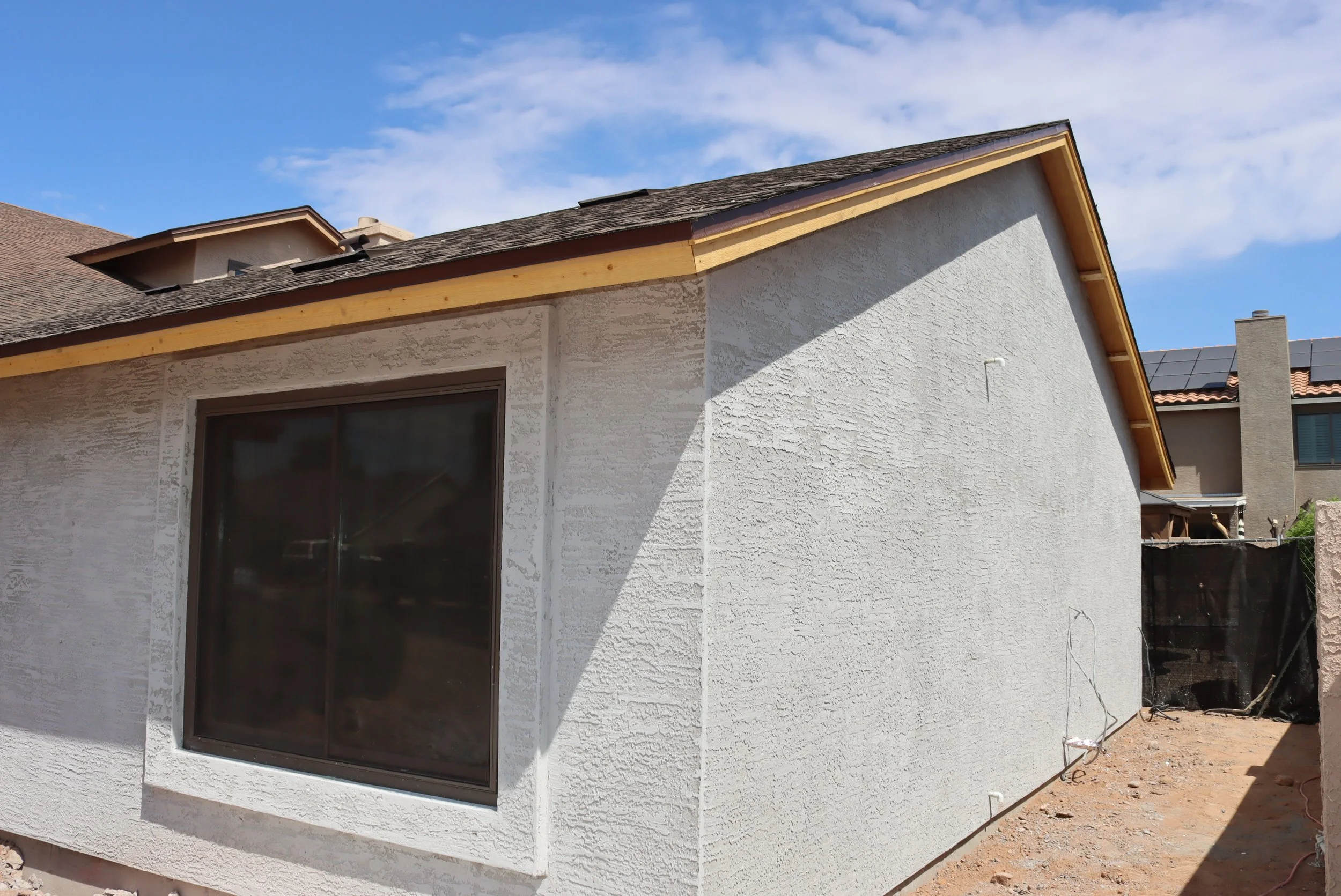 Professional stucco application on a residential home addition in Mesa, Arizona, demonstrating commercial-grade durability and finish by Bull Plastering (image_8010f8.jpg).