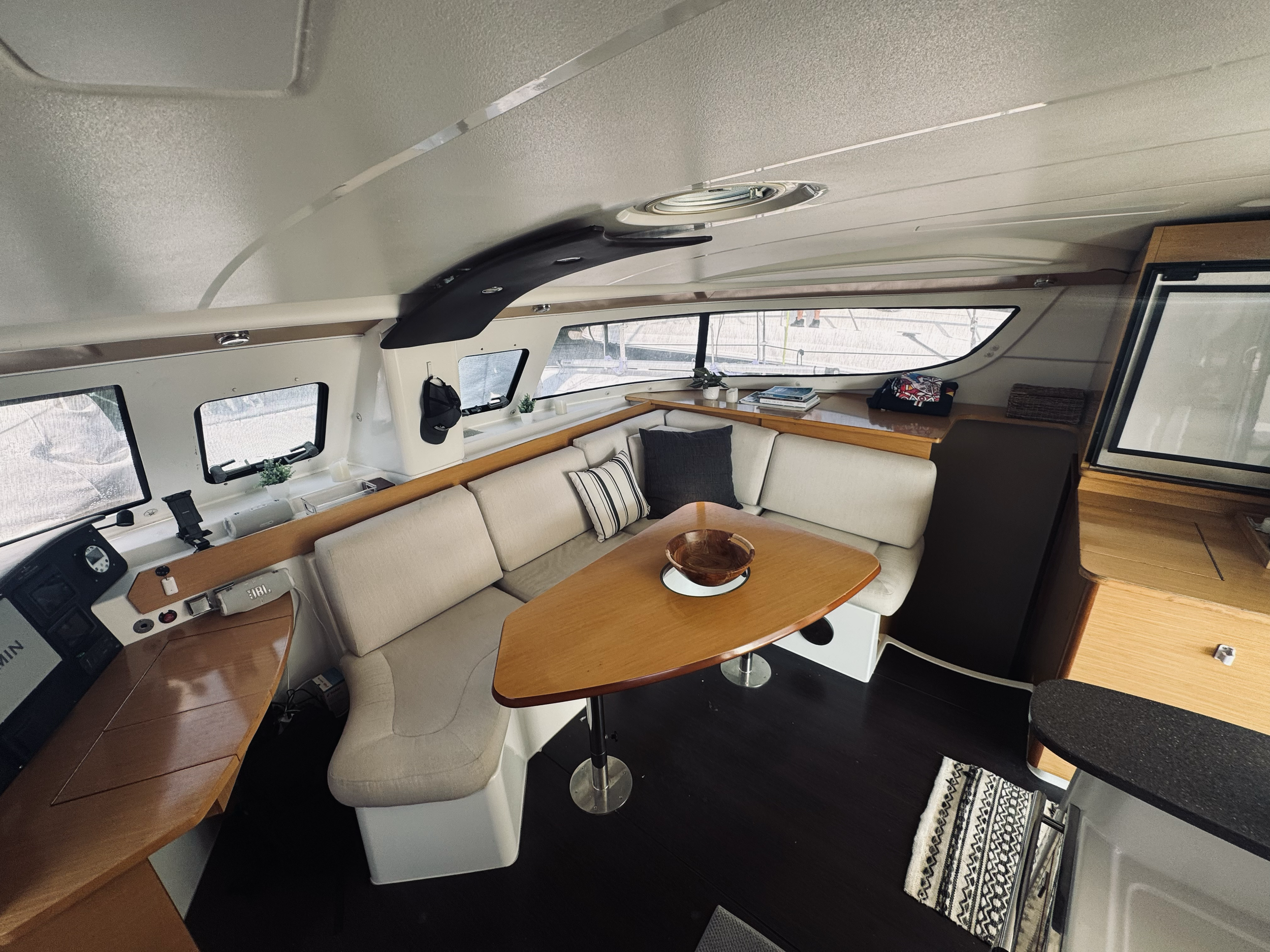 Enclosed seating in the salon with 2 restrooms down the companionways