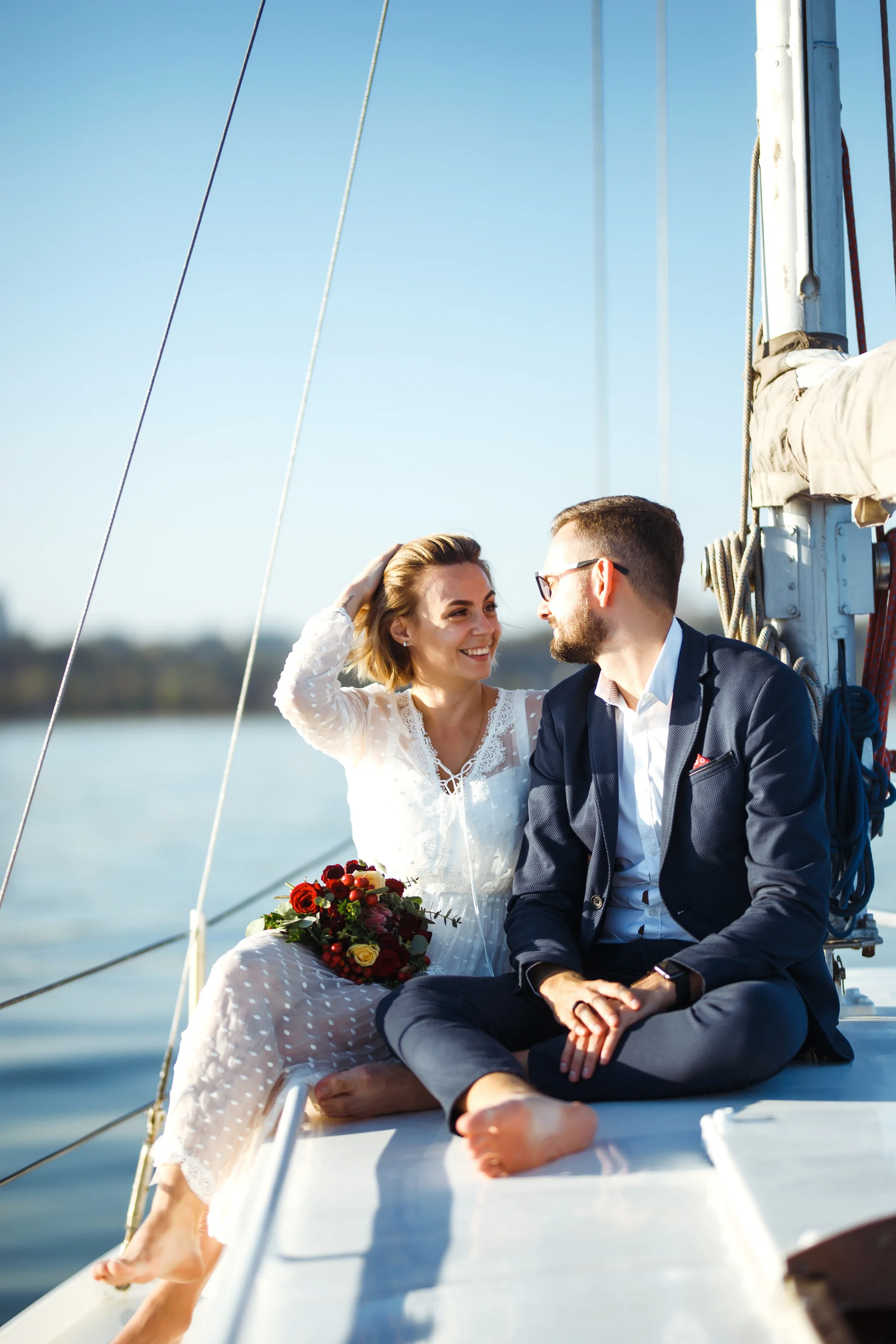A romantic proposal setup on the deck of a private catamaran on Lake Michigan.