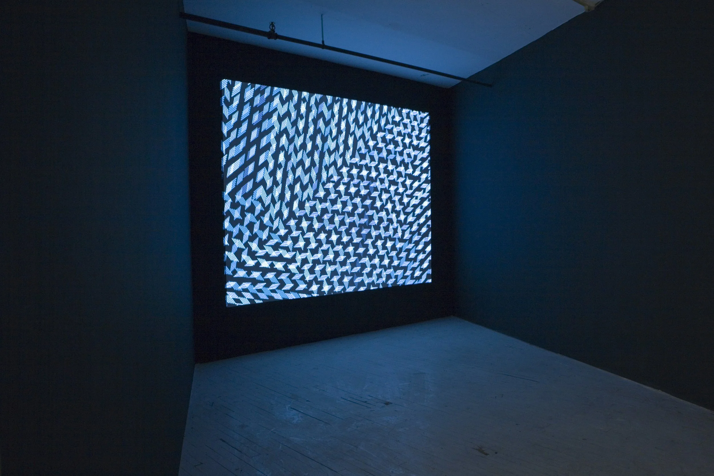 Installation view of a single-channel video animation in a parallelogram-shaped room.