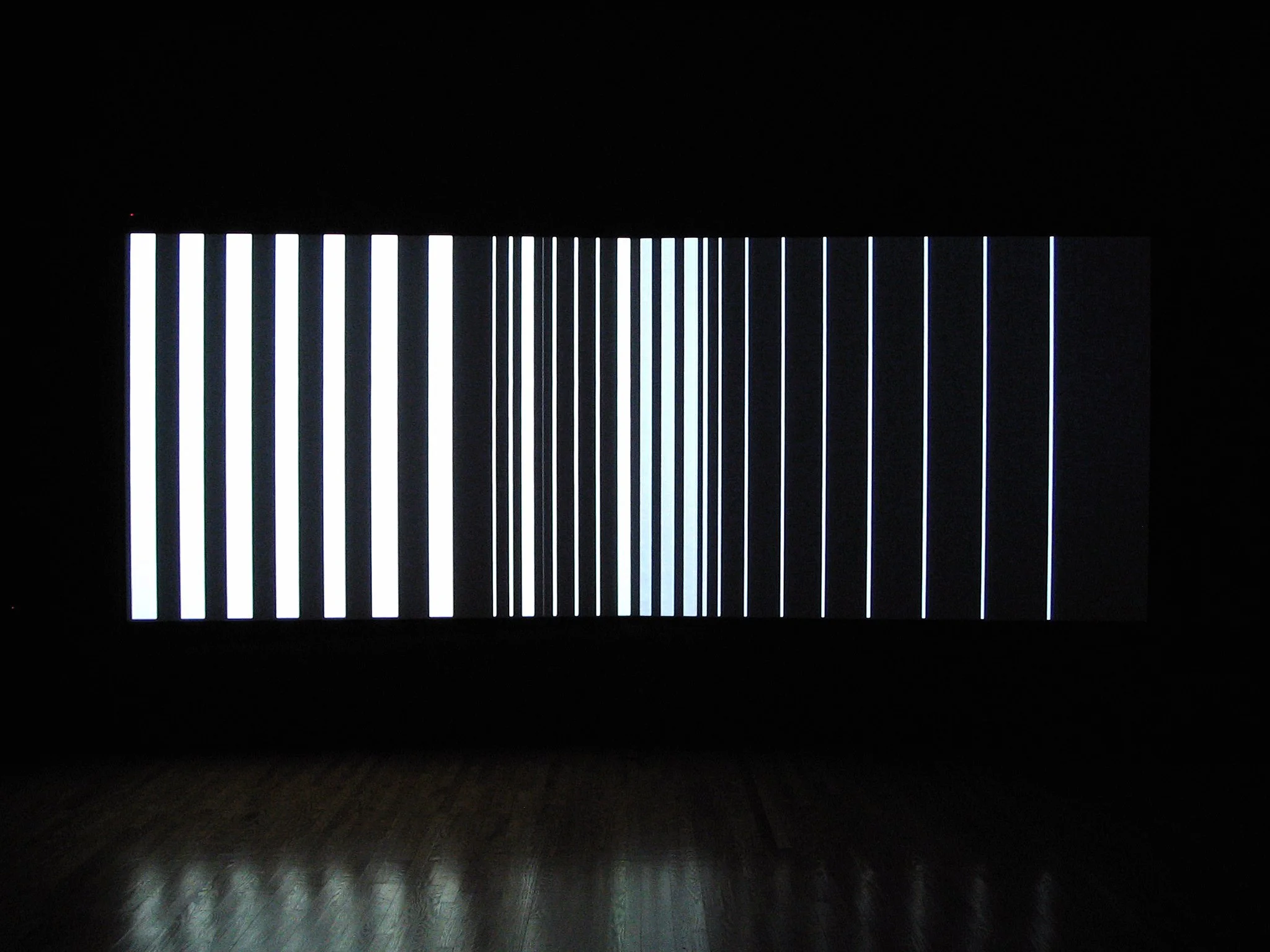Installation view of a two-channel video animation with custom screens.