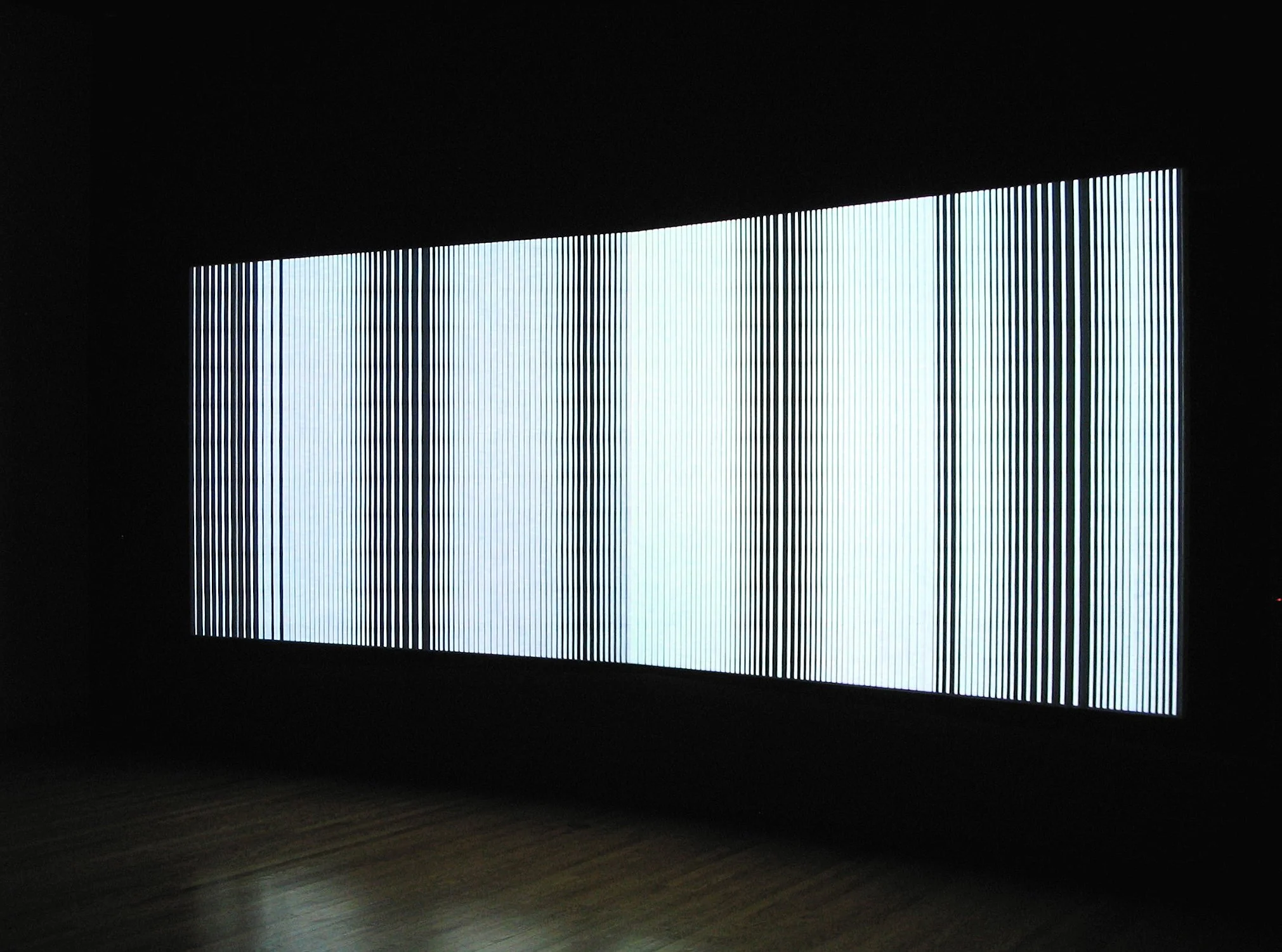 Installation view of a two-channel video animation with custom screens.