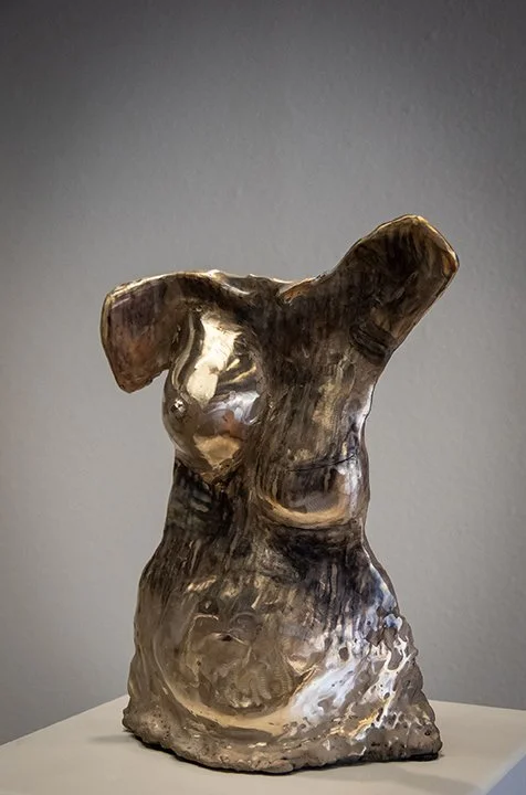 bronze woman bust. heat patina.